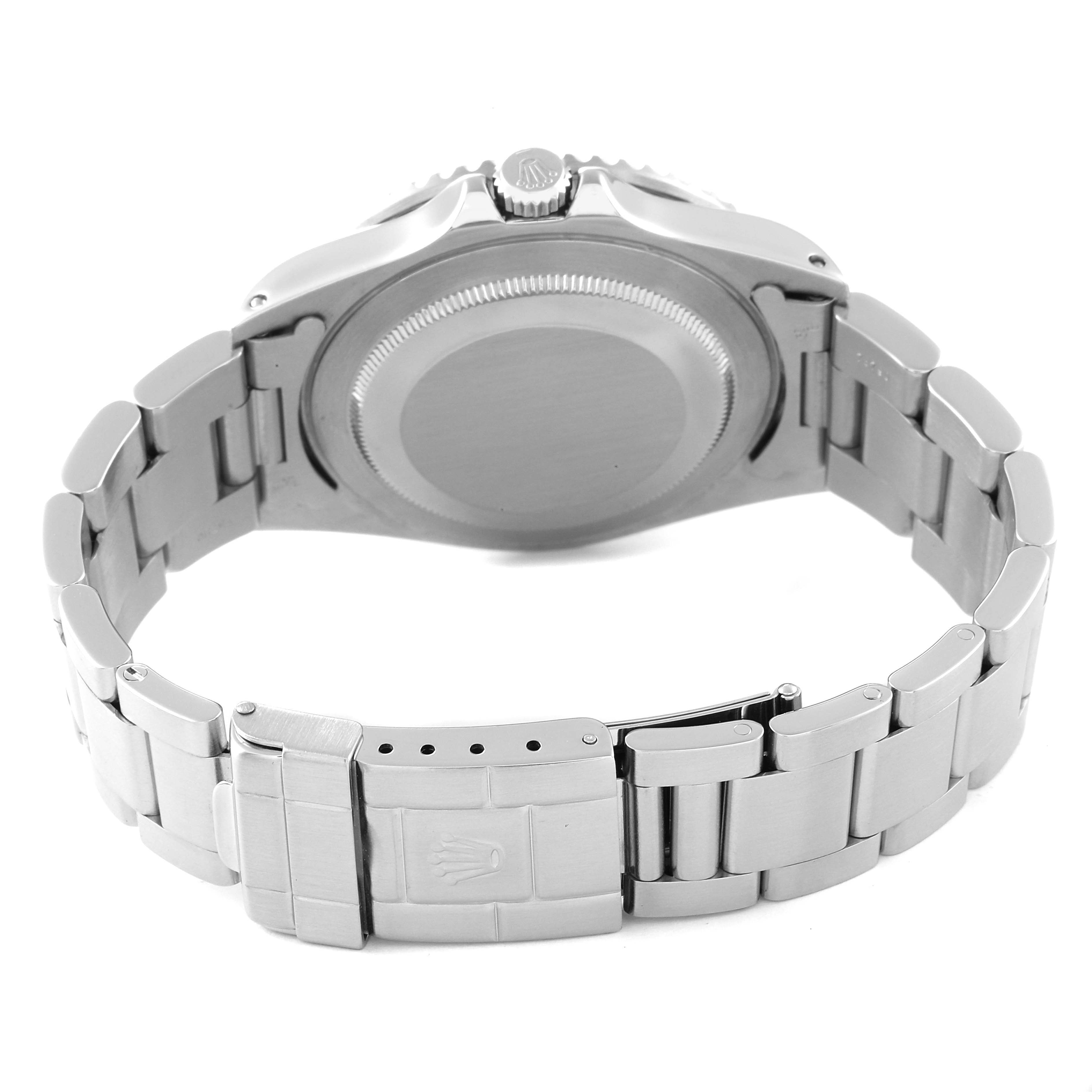 This image shows the back of a Rolex GMT-Master 16700 Men's Stainless Steel Black Dial 16700 Men's Stainless Steel Black Dial watch, with a view of its clasp, bracelet, and caseback.