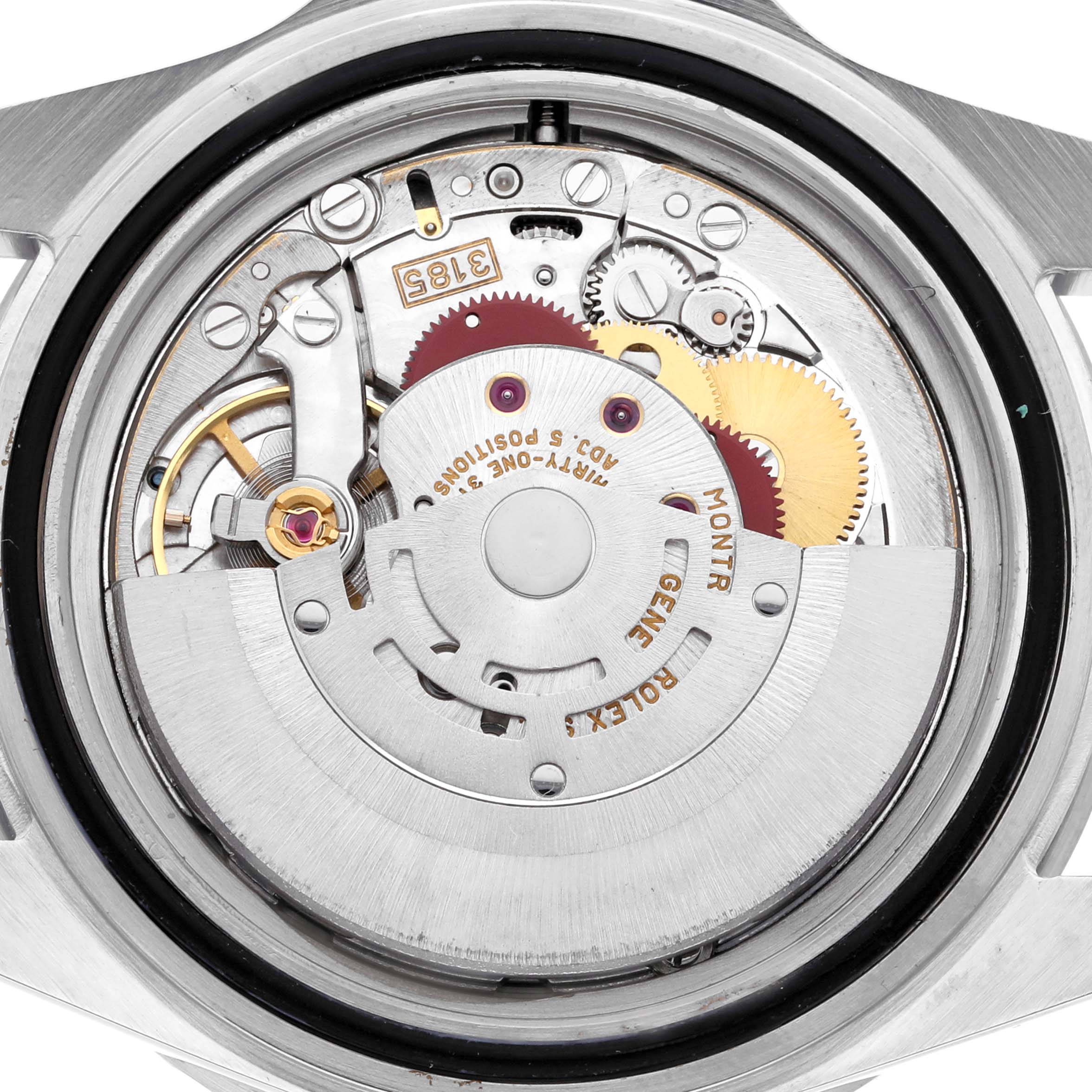 The image shows the rear movement of a Rolex GMT-Master 16710 Men
s Stainless Steel Black Dial 16710 Men
s Stainless Steel Black Dial watch, highlighting its intricate gears and rotor.