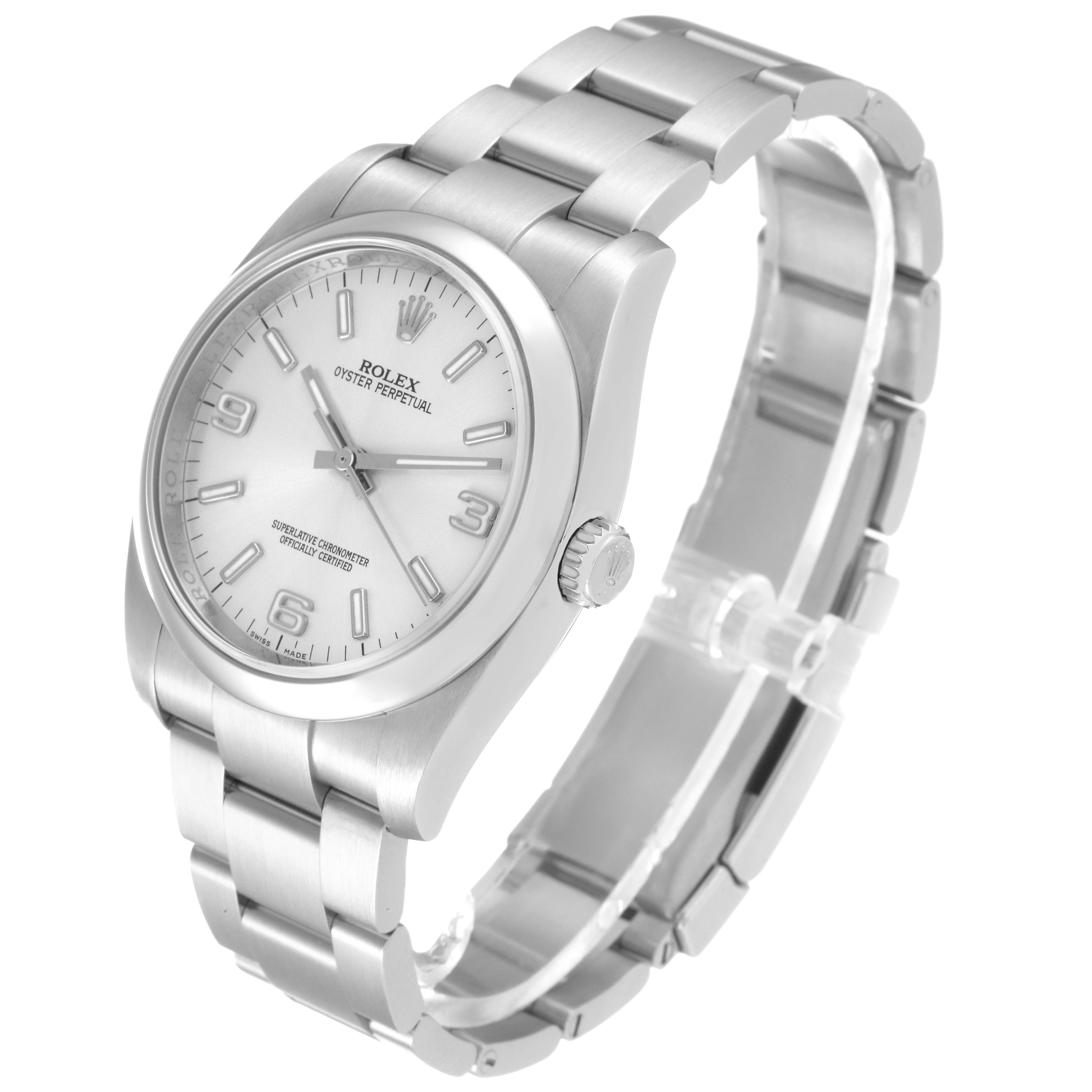 The Rolex Oyster Perpetual 116000 Men
s Stainless Steel Silver Dial 116000 Men
s Stainless Steel Silver Dial watch is shown from an angled side view highlighting the case, crown, dial, and bracelet.