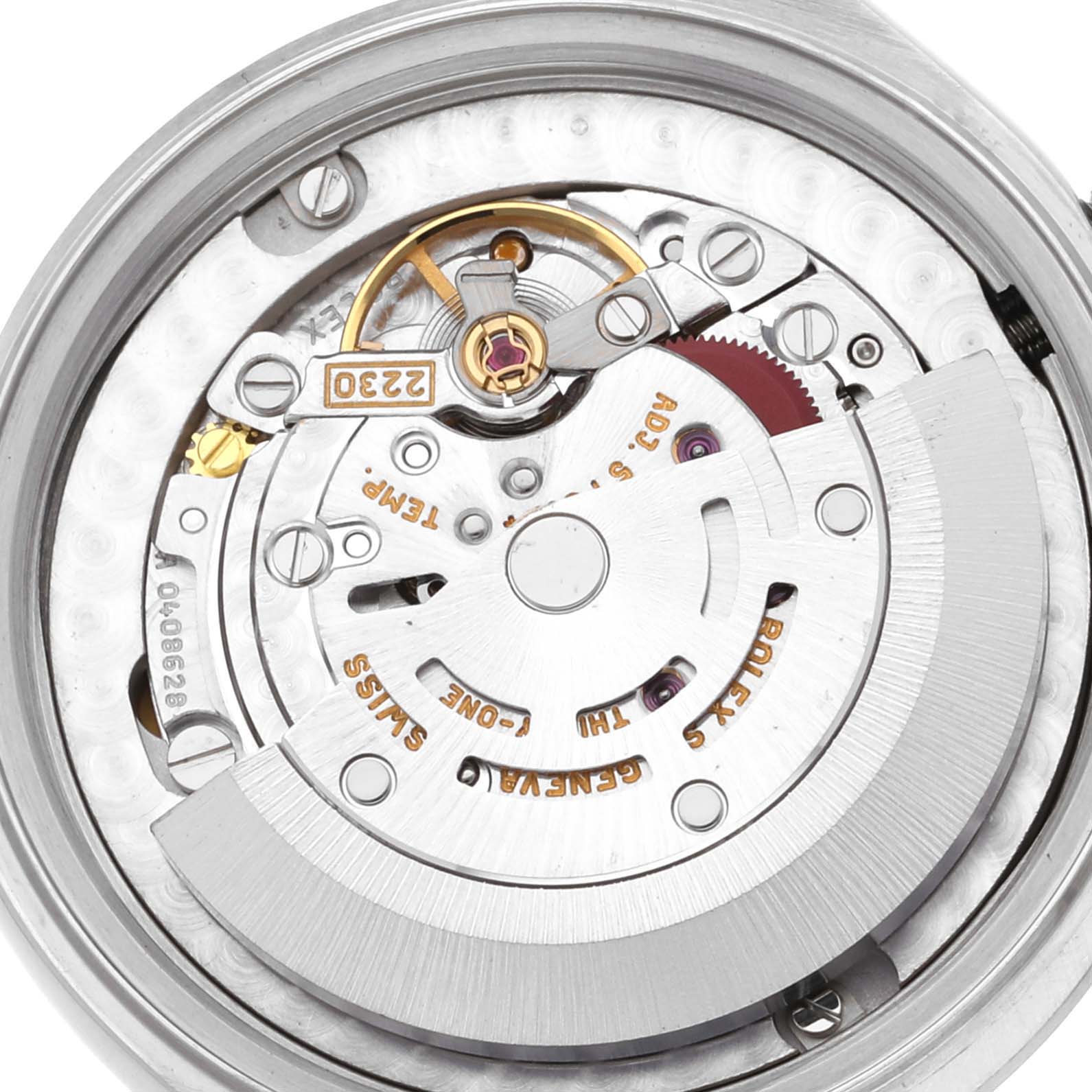 The image shows a close-up of the internal movement and mechanics of a Rolex Mid-Size 77080 Women
s Stainless Steel Blue Dial 77080 Women
s Stainless Steel Blue Dial model watch.