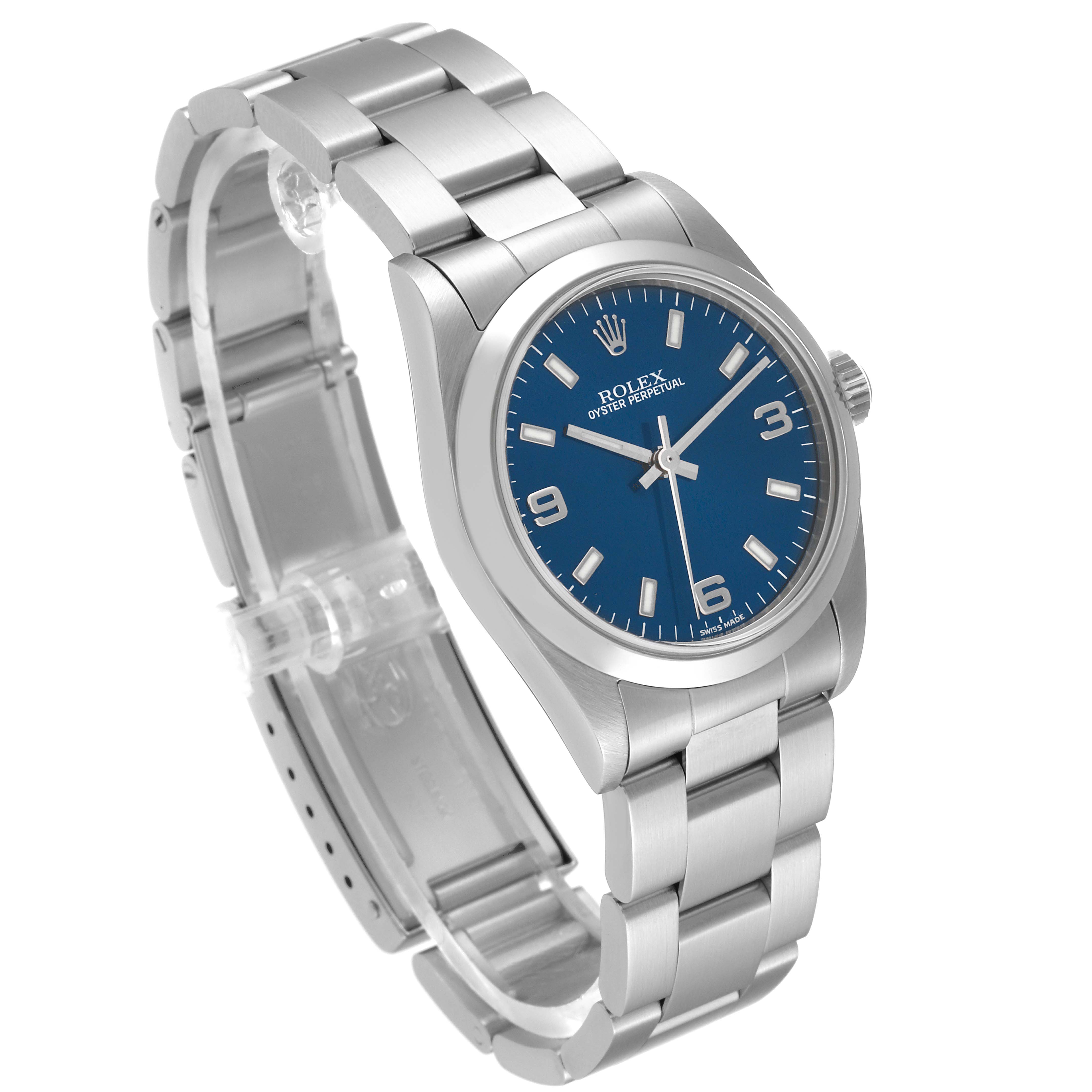 The image shows a Rolex Mid-Size 77080 Women
s Stainless Steel Blue Dial 77080 Women
s Stainless Steel Blue Dial Oyster Perpetual watch at a three-quarter angle, highlighting the bracelet, blue dial, and crown.