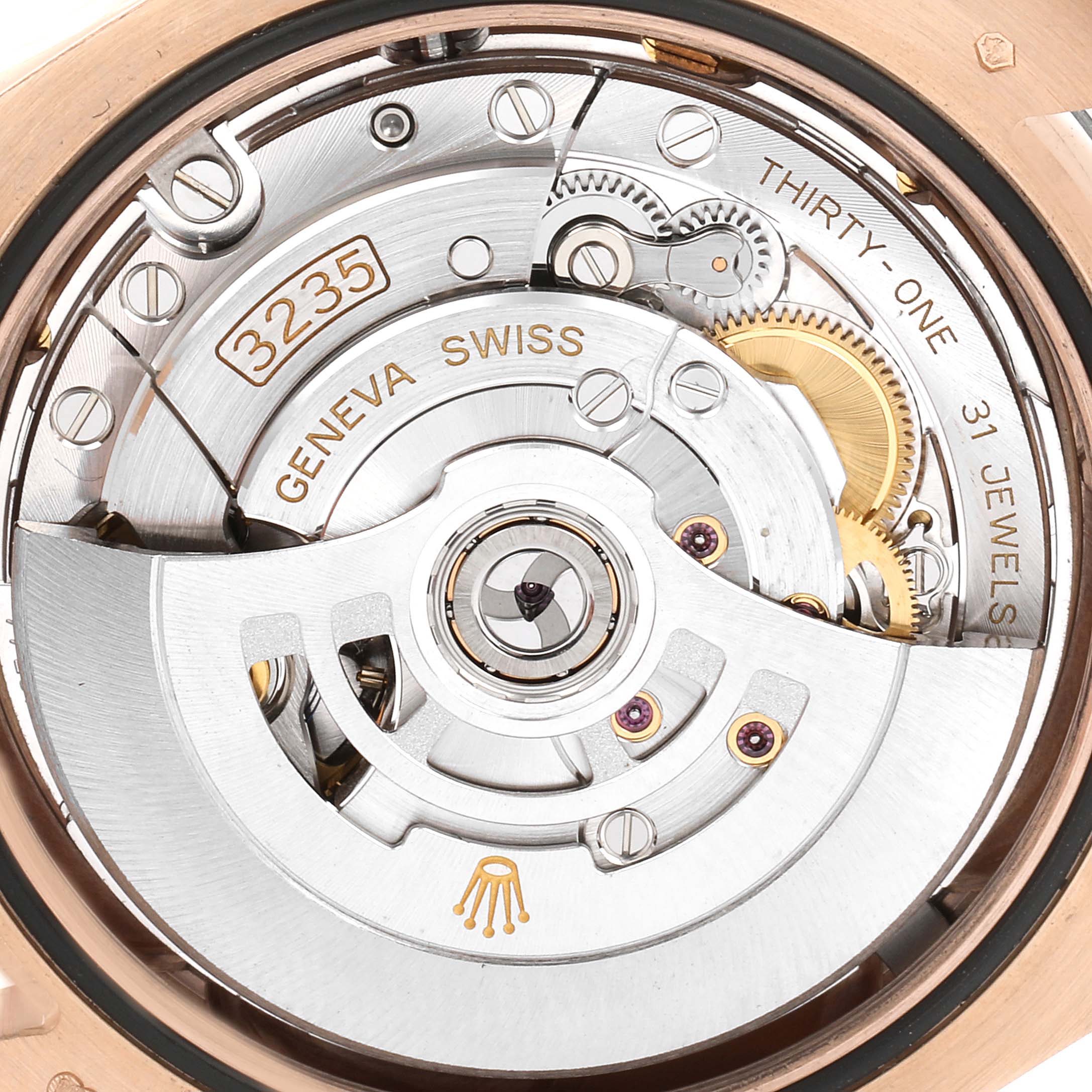 The image shows the intricate internal mechanism of the Rolex Pearlmaster 86285 Men's Rose Gold Blue Dial 86285 Men's Rose Gold Blue Dial watch, viewed from the case back.