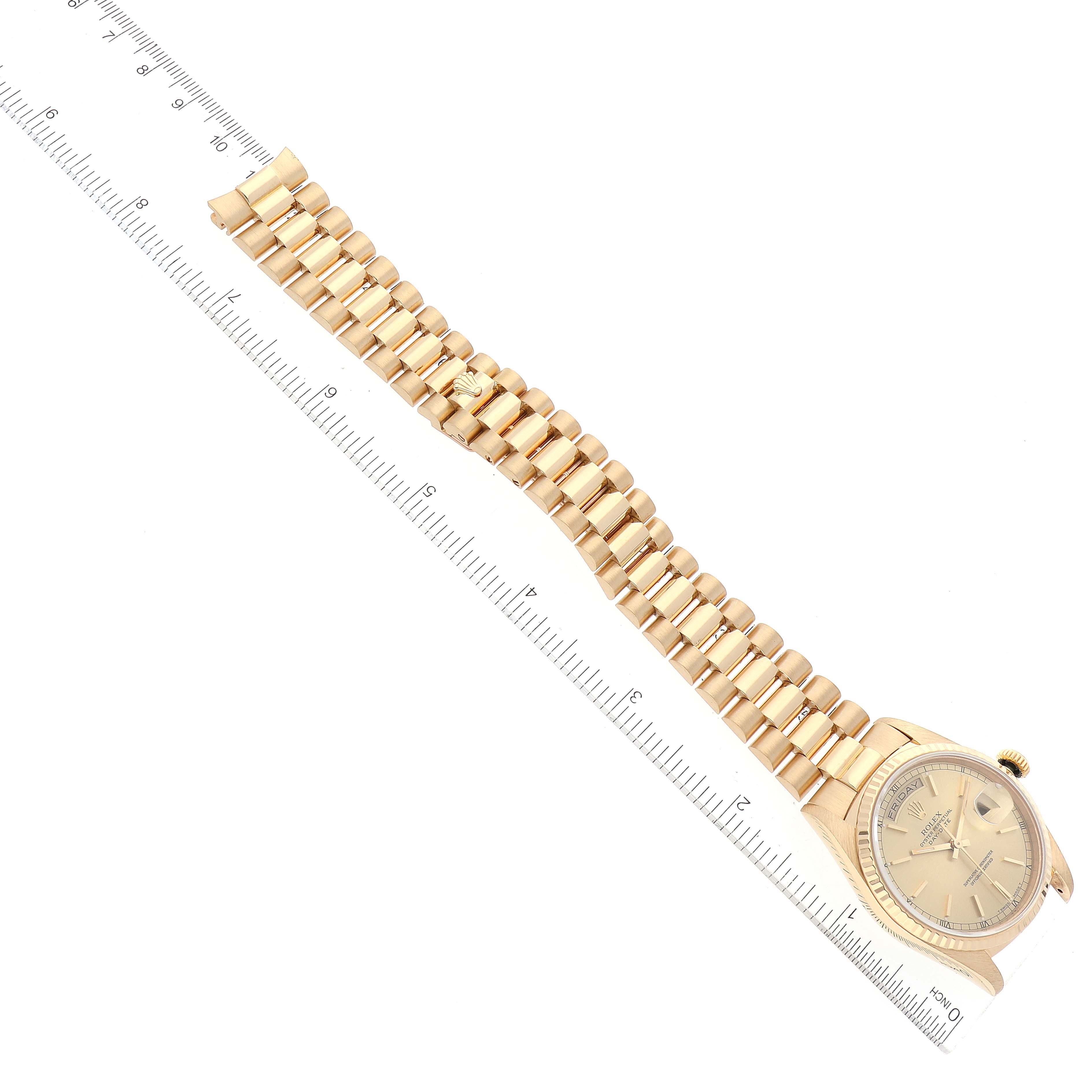 The image shows a Rolex President 18238 Men's Yellow Gold Champagne Dial 18238 Men's Yellow Gold Champagne Dial model watch laying flat with its bracelet extended, accompanied by a ruler for measurement.