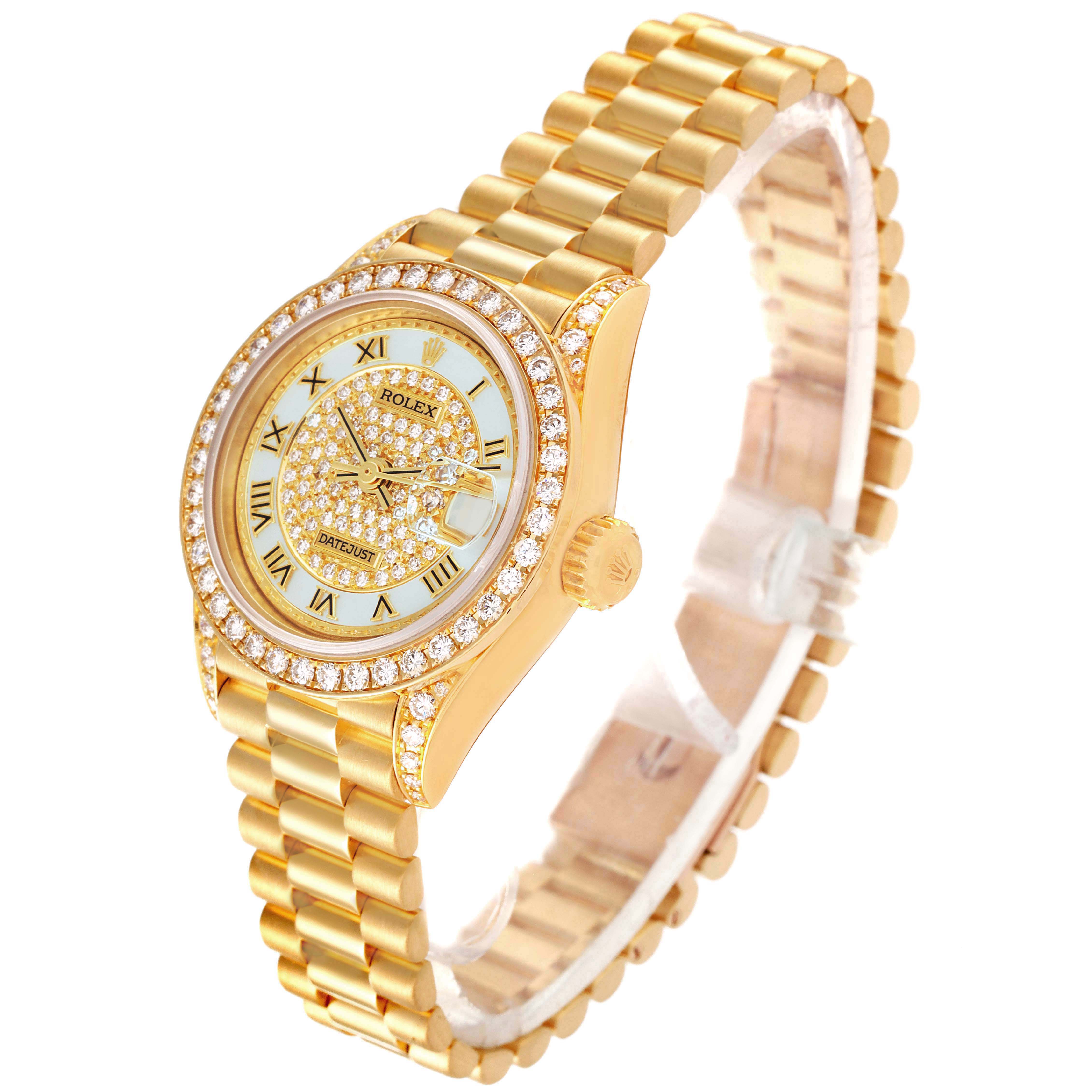 The image shows a Rolex President 69158 Women's Yellow Gold Mother of Pearl Dial 69158 Women's Yellow Gold Mother of Pearl Dial model watch angled to display the face, bezel, crown, and bracelet.