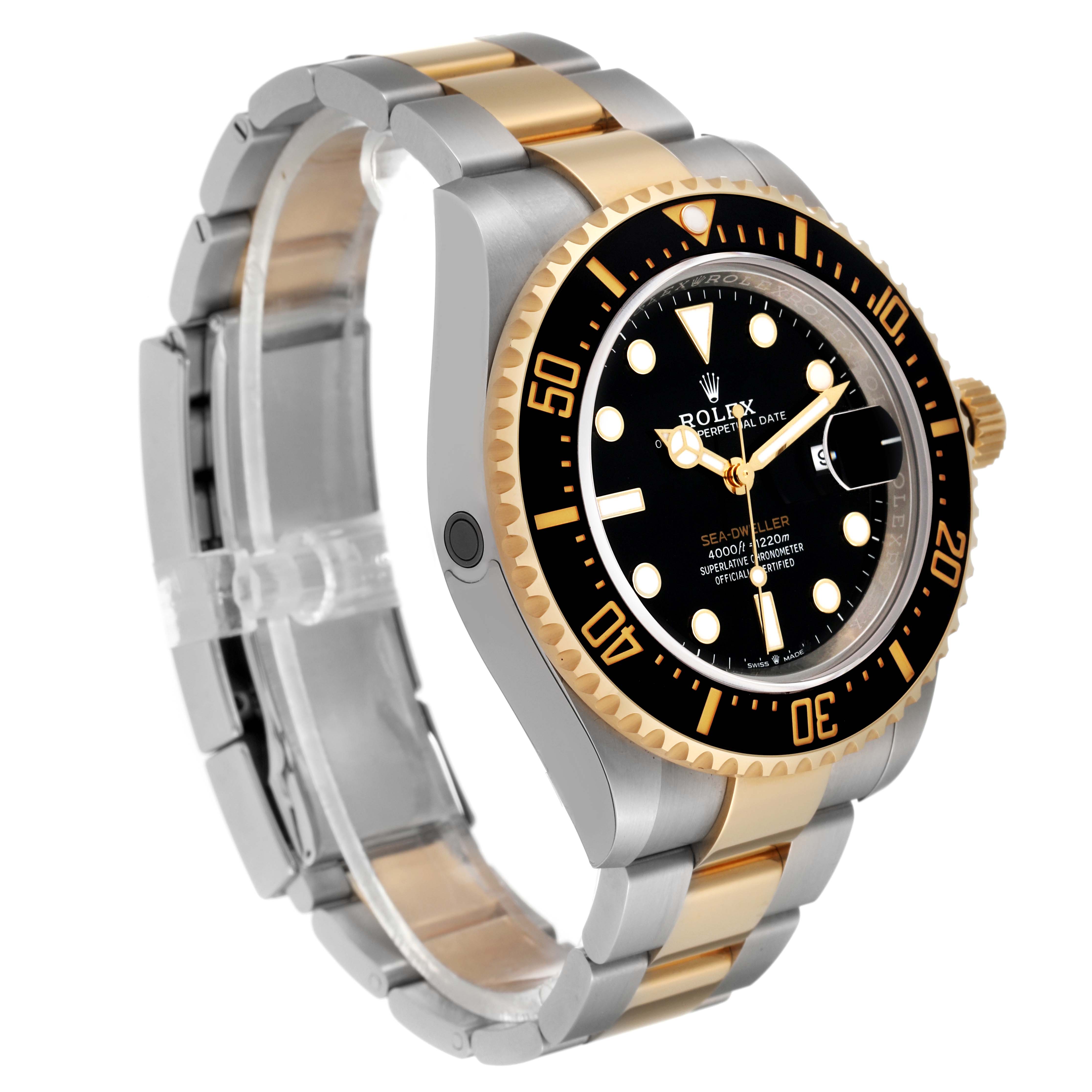 The image shows a side angle of a Rolex Sea-Dweller M126603 Men
s Steel and Gold (two tone) Black Dial M126603 Men
s Steel and Gold (two tone) Black Dial watch, highlighting its black dial, gold details, and two-tone band.