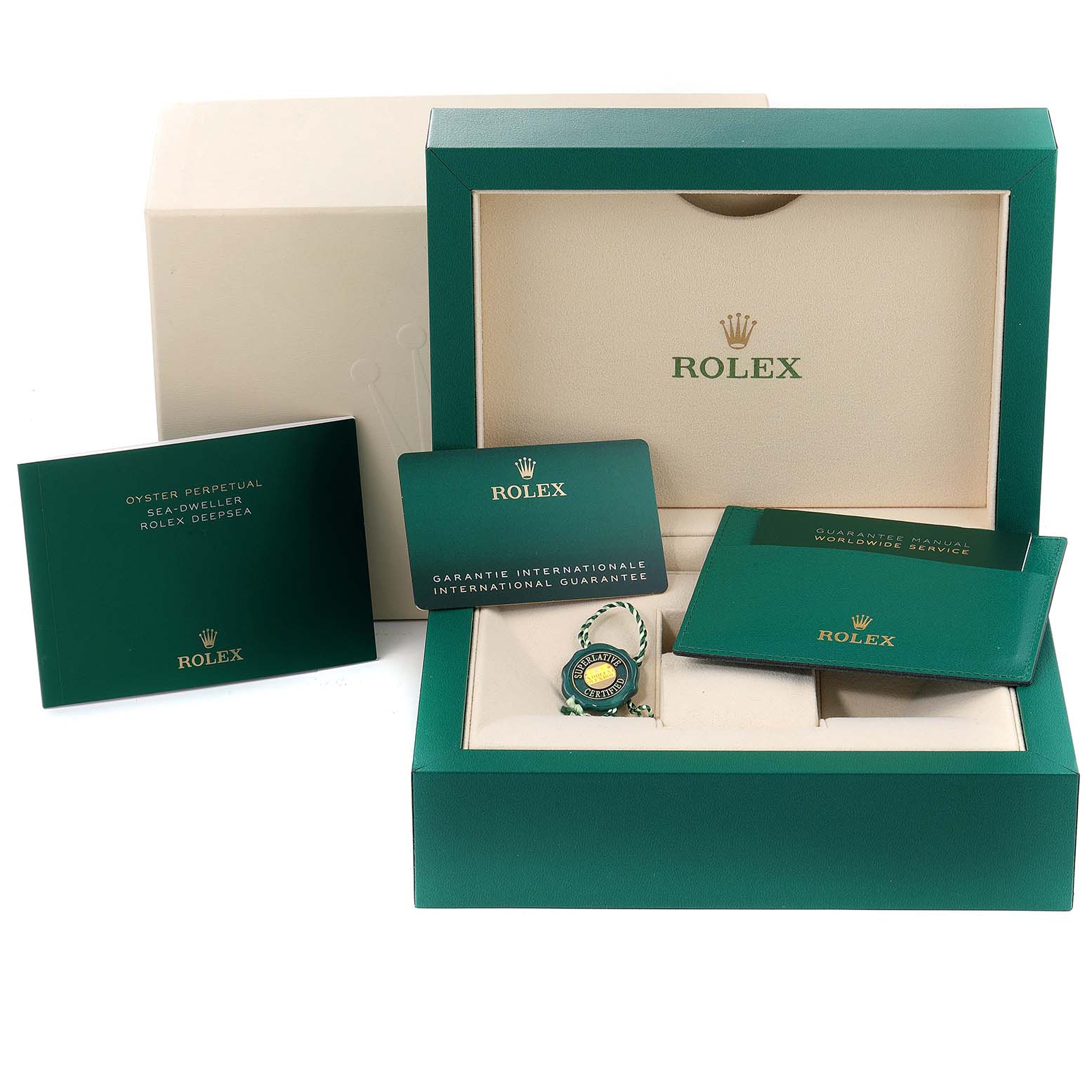 This image shows the Rolex Sea-Dweller 126660 Men
s Stainless Steel Black Dial 126660 Men
s Stainless Steel Black Dial watch packaging, warranty card, manuals, and green tags from a top angle.