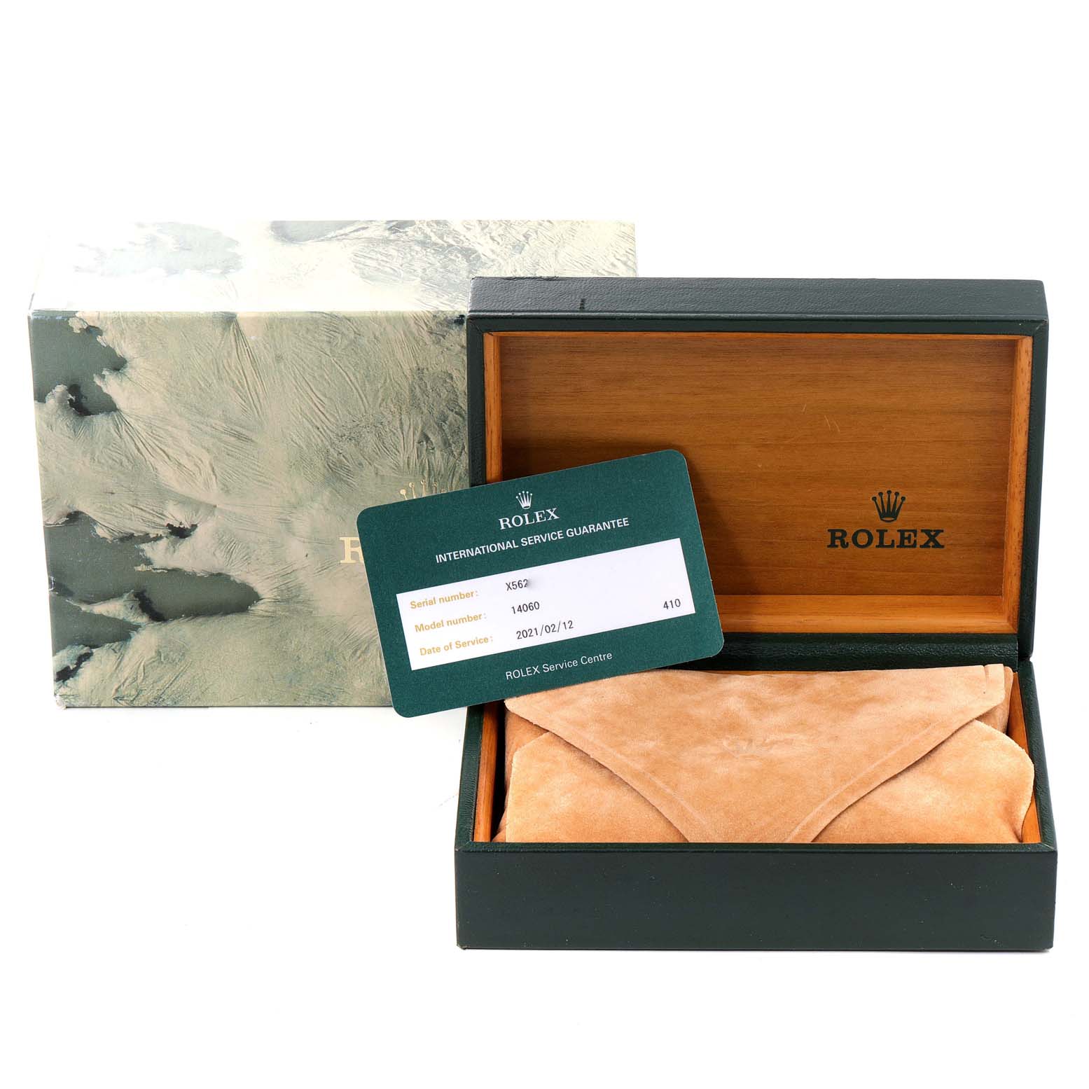 This image shows the packaging, box, and guarantee card for a Rolex Submariner 14060 Men
s Stainless Steel Black Dial 14060 Men
s Stainless Steel Black Dial watch.