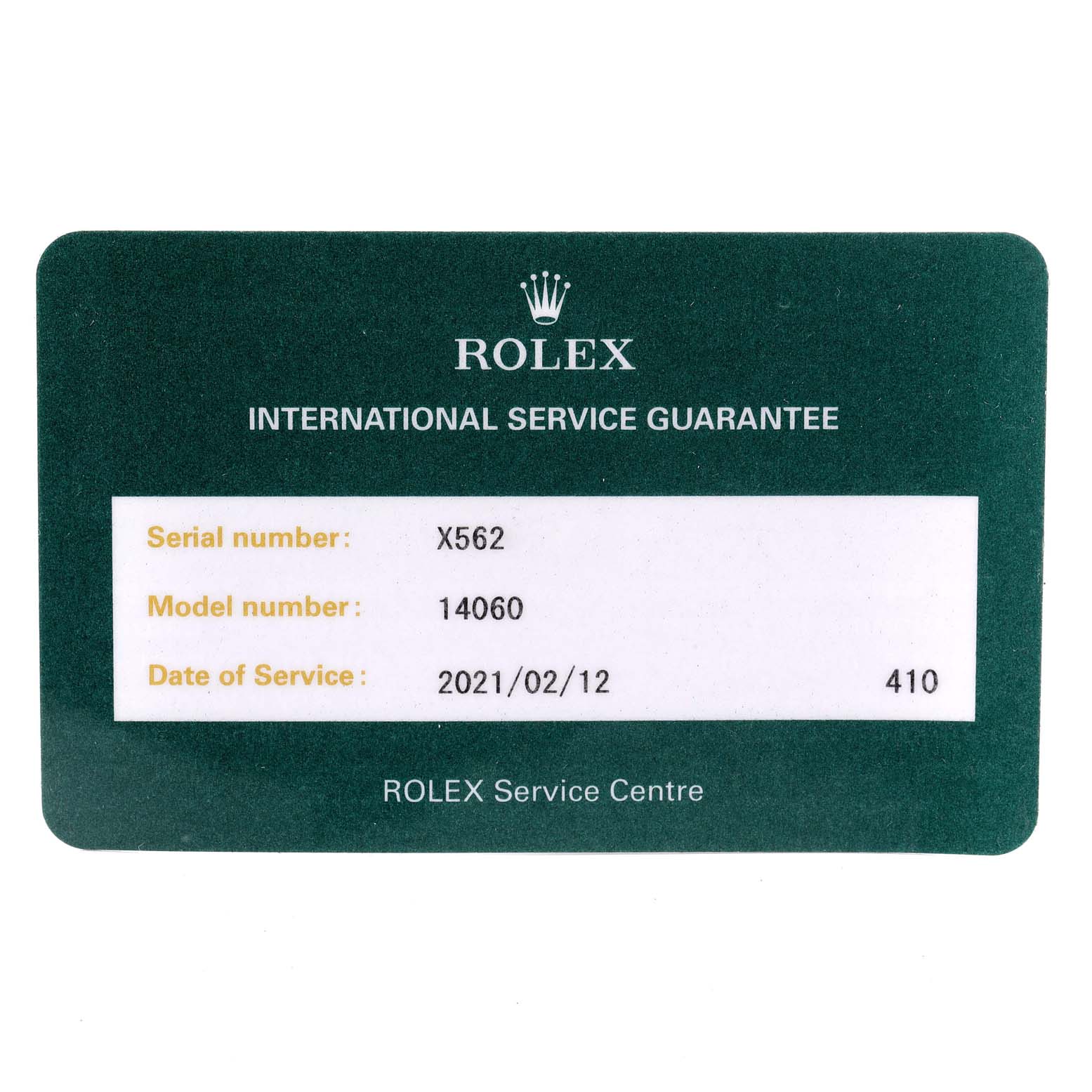 This image shows the Rolex International Service Guarantee card for the Rolex Submariner 14060 Men
s Stainless Steel Black Dial 14060 Men
s Stainless Steel Black Dial model 14060 with serial number X562.