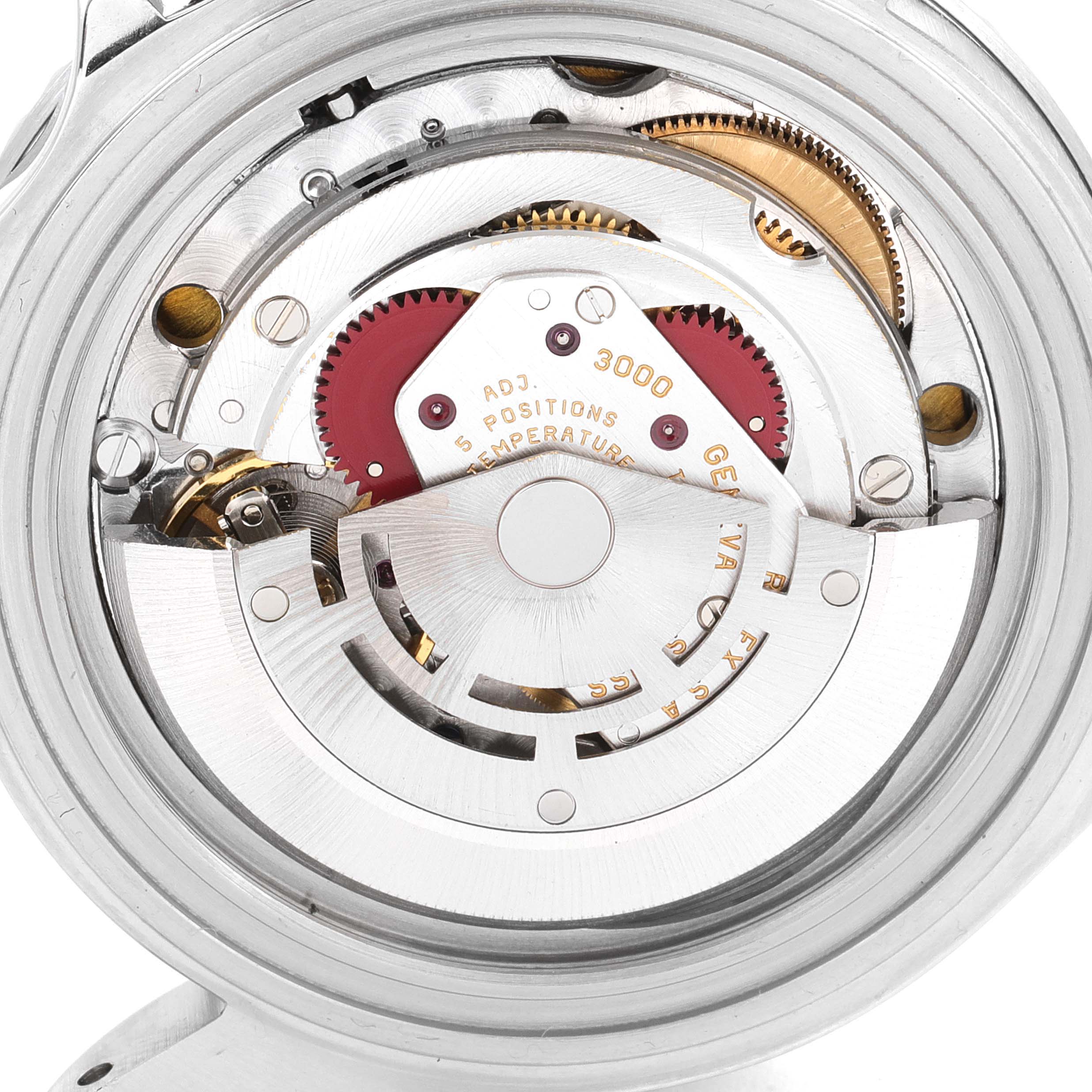 This image shows an angled view of the internal movement mechanism of a Rolex Submariner 14060 Men
s Stainless Steel Black Dial 14060 Men
s Stainless Steel Black Dial watch.