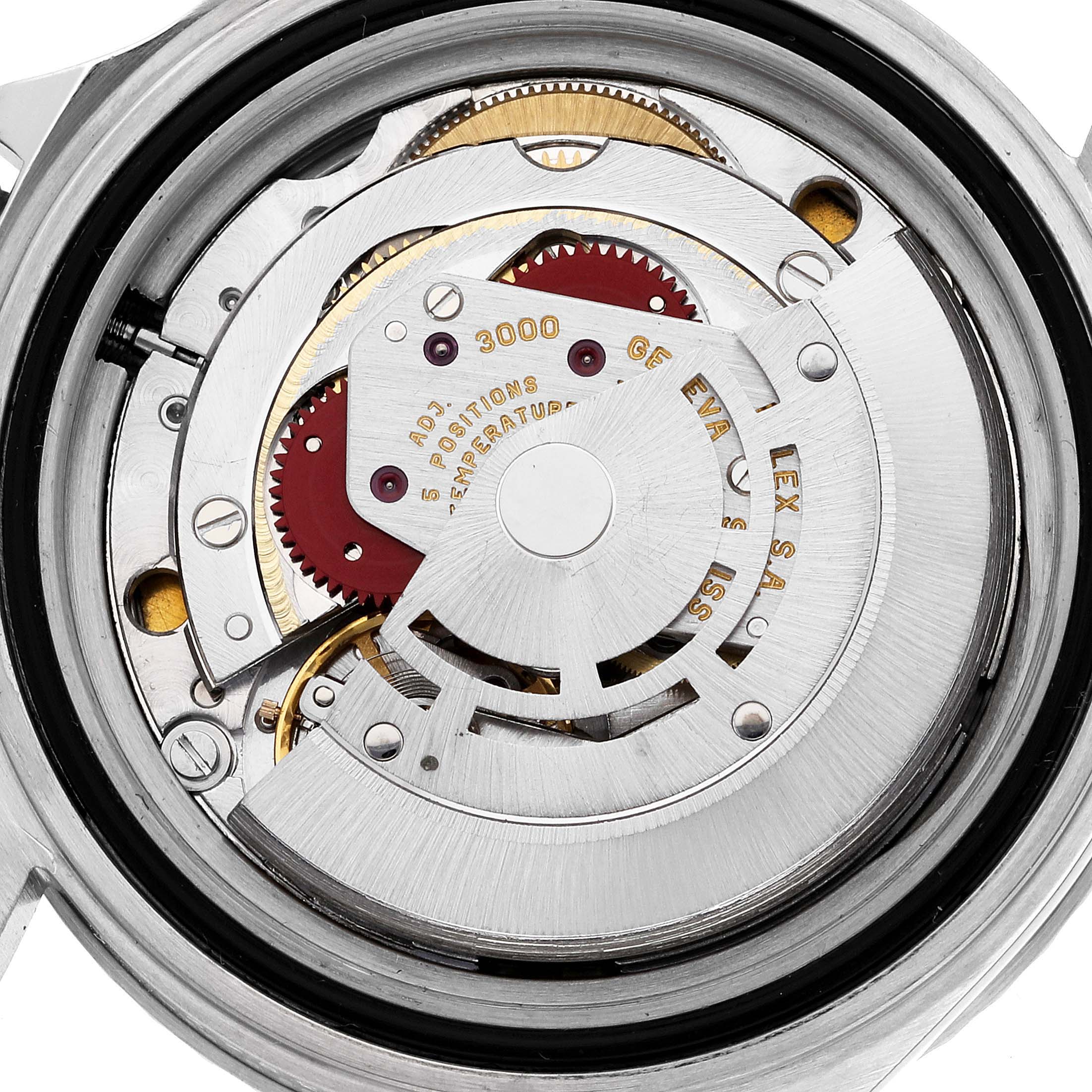 This image shows a close-up of the movement and internal mechanism of a Rolex Submariner 14060 Men
s Stainless Steel Black Dial 14060 Men
s Stainless Steel Black Dial watch.