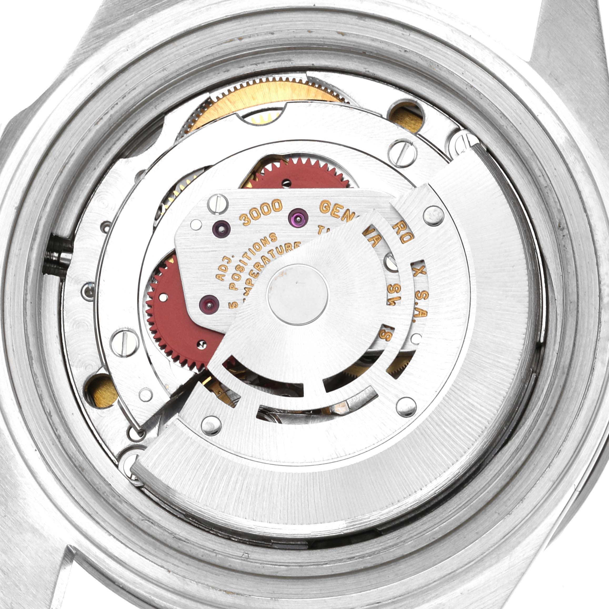 This image shows the internal movement mechanism of the Rolex Submariner 14060 Men
s Stainless Steel Black Dial 14060 Men
s Stainless Steel Black Dial watch from a rear angle with the case back removed.