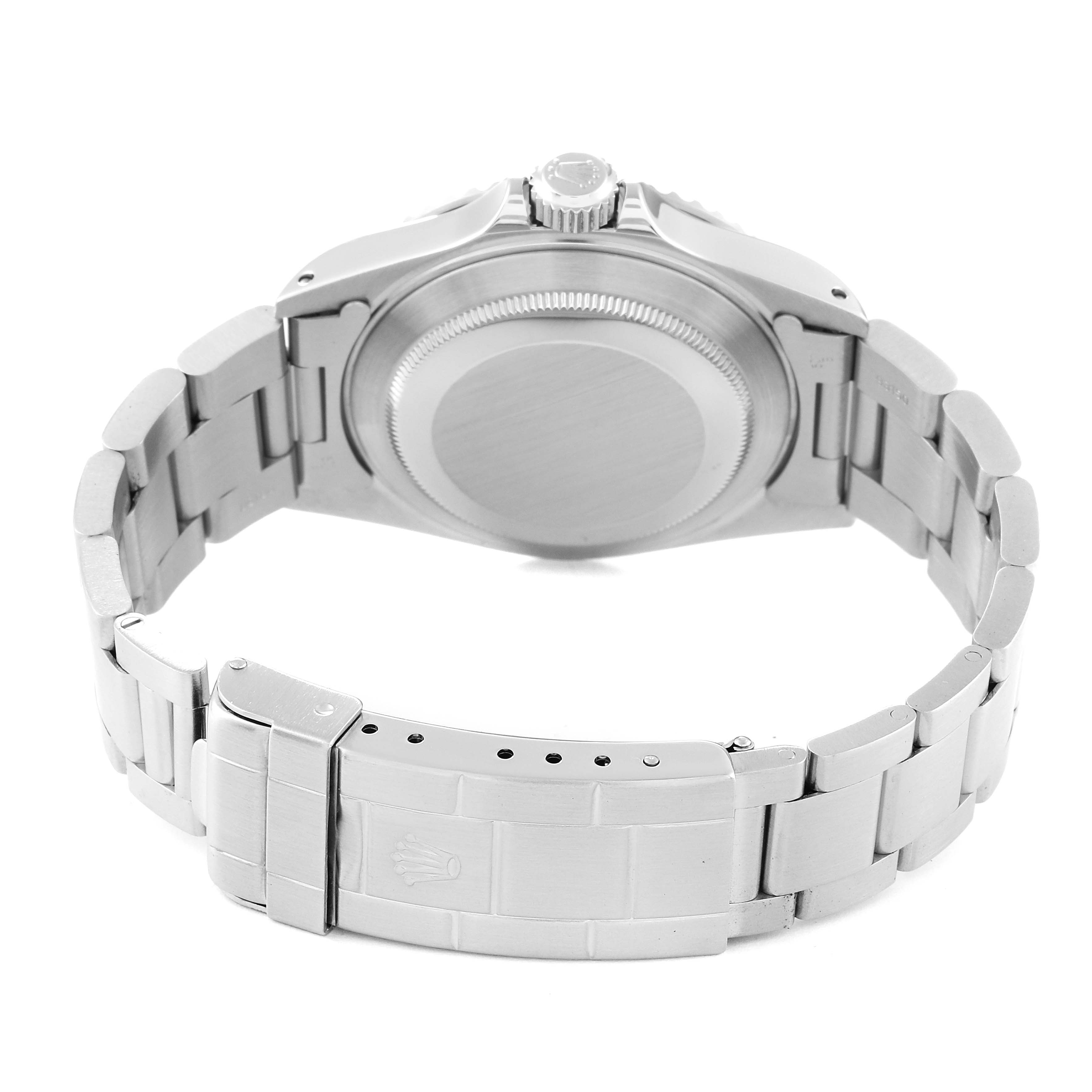 The image shows the back view of a Rolex Submariner 14060 Men
s Stainless Steel Black Dial 14060 Men
s Stainless Steel Black Dial watch, highlighting the case back, bracelet, and clasp.