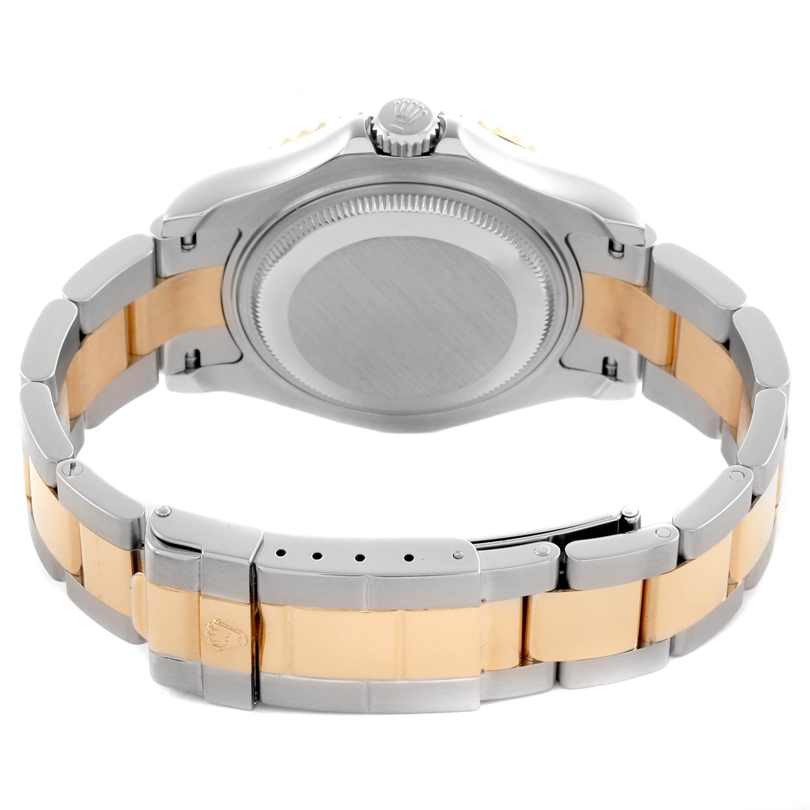The Rolex Yacht-Master 168623 Men's Steel and Gold (two tone) Mother of Pearl Dial 168623 Men's Steel and Gold (two tone) Mother of Pearl Dial watch is shown from the back, displaying the bracelet, clasp, and caseback.