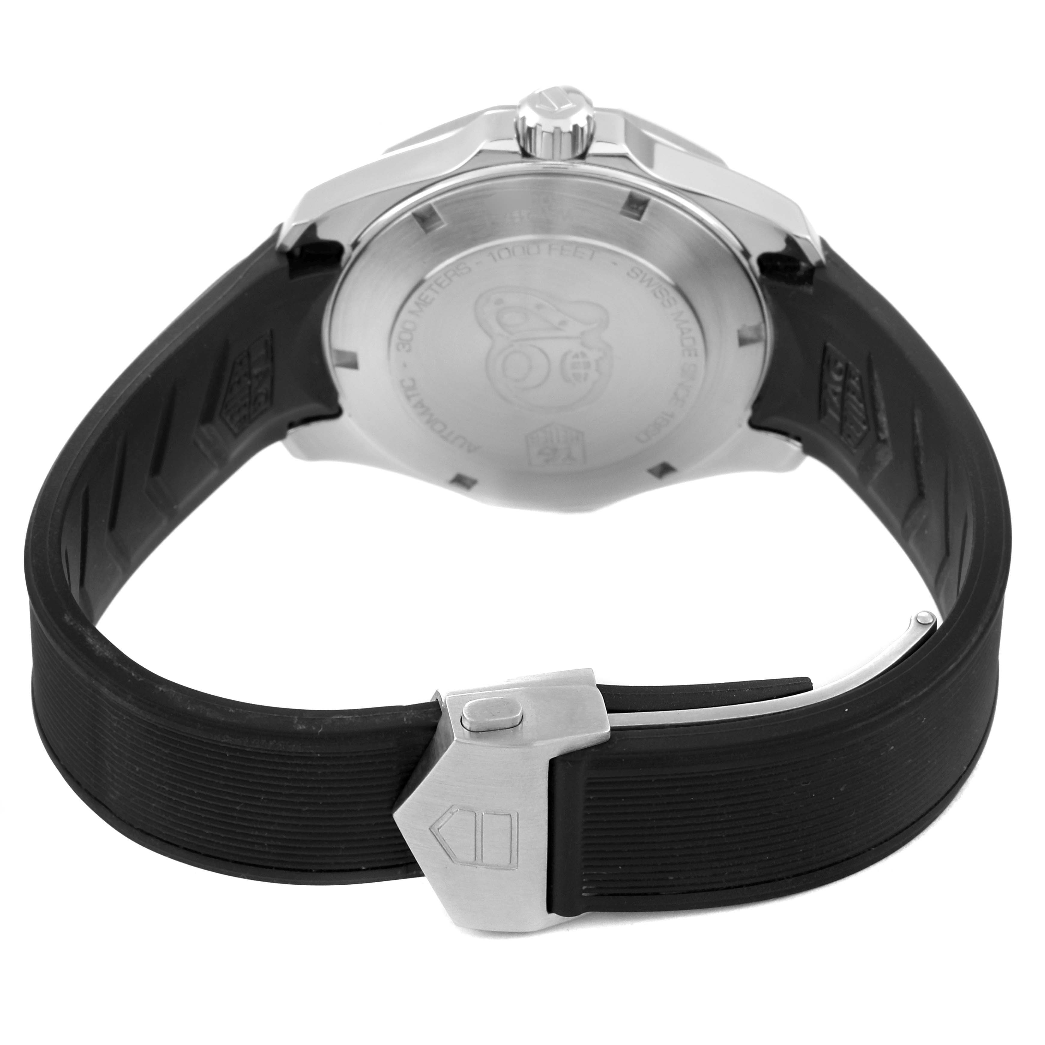 The image shows the back case and rubber strap of a Tag Heuer Aquaracer WAY211A Men's Stainless Steel Black Dial WAY211A Men's Stainless Steel Black Dial watch, focusing on the clasp and case back.