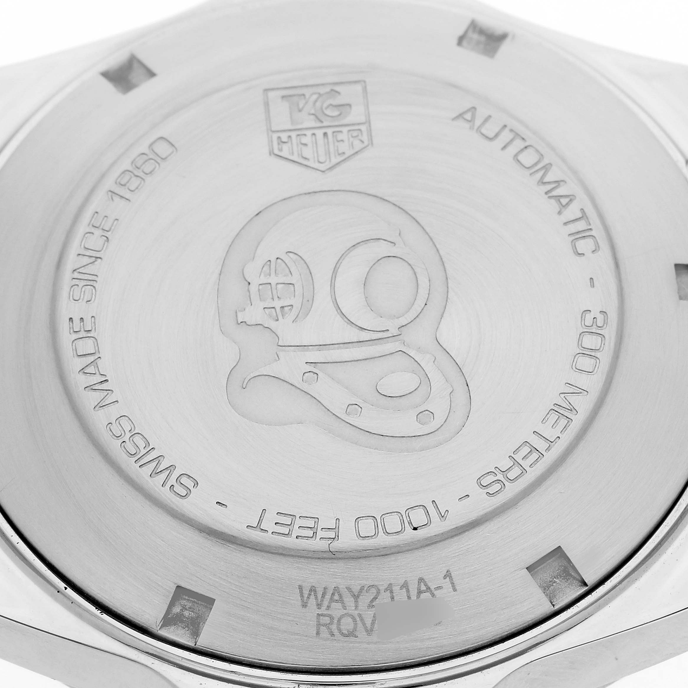 The image shows the back casing of a Tag Heuer Aquaracer WAY211A Men's Stainless Steel Black Dial WAY211A Men's Stainless Steel Black Dial watch, highlighting its engravings and branding.