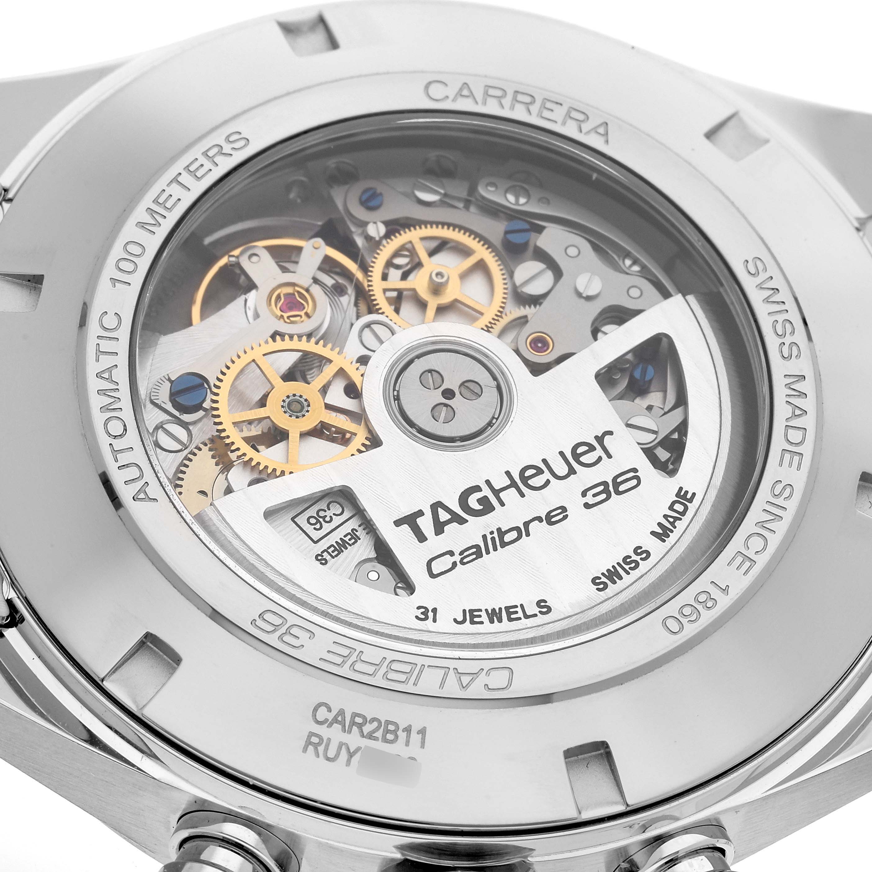 This image shows the back of the Tag Heuer Carrera CAR2B11.BA0799 Men's Stainless Steel Grey Dial CAR2B11.BA0799 Men's Stainless Steel Grey Dial watch model, showcasing its Calibre 36 mechanism and inscriptions.