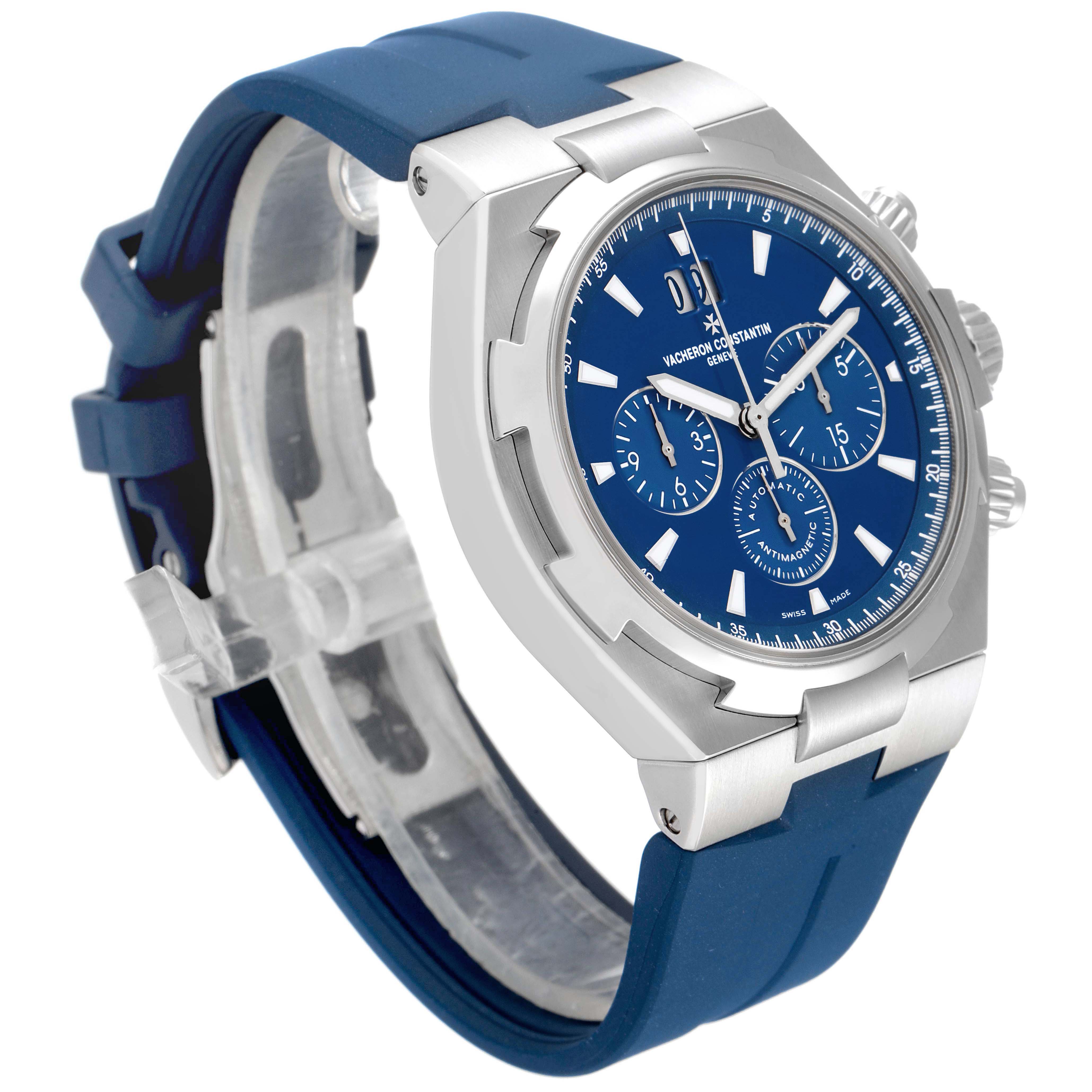 The Vacheron Constantin Overseas 49150/000A-9745 Men's Stainless Steel Blue Dial watch is shown at a three-quarter angle, highlighting the blue dial, chronograph, and blue strap.