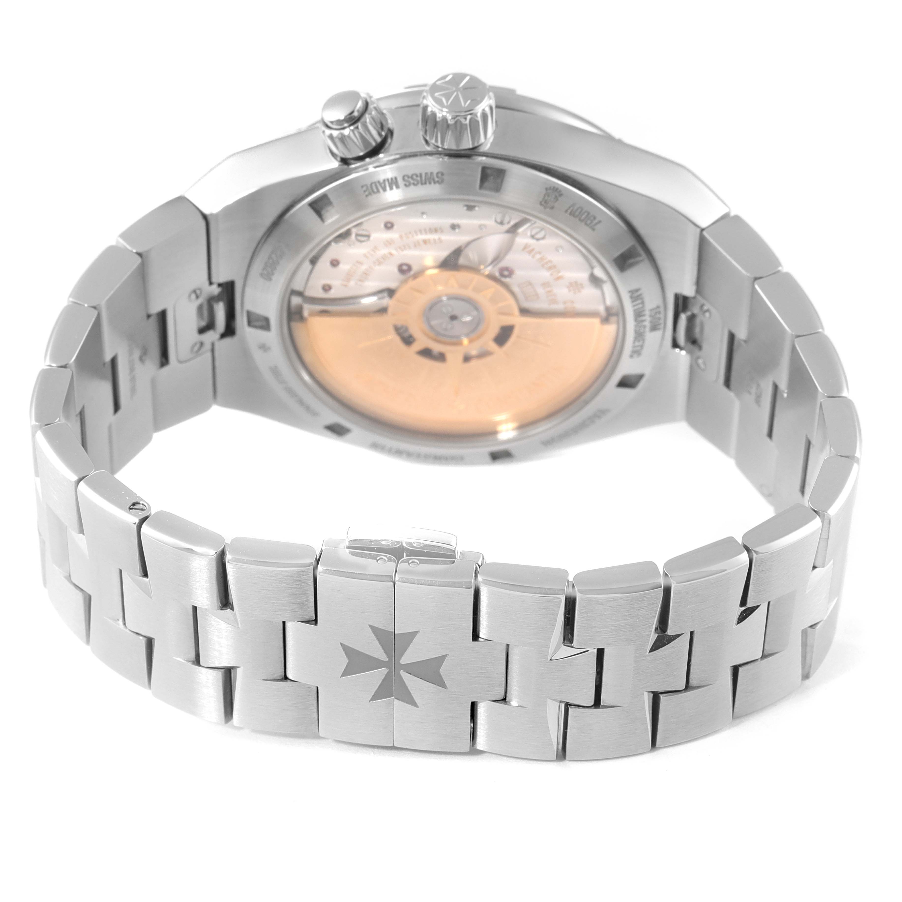 This Vacheron Constantin Overseas 7900V/110A-B546 Men's Stainless Steel Black Dial 7900V/110A-B546 Men's Stainless Steel Black Dial watch is shown from the back, revealing the mechanical movement and bracelet engraving.