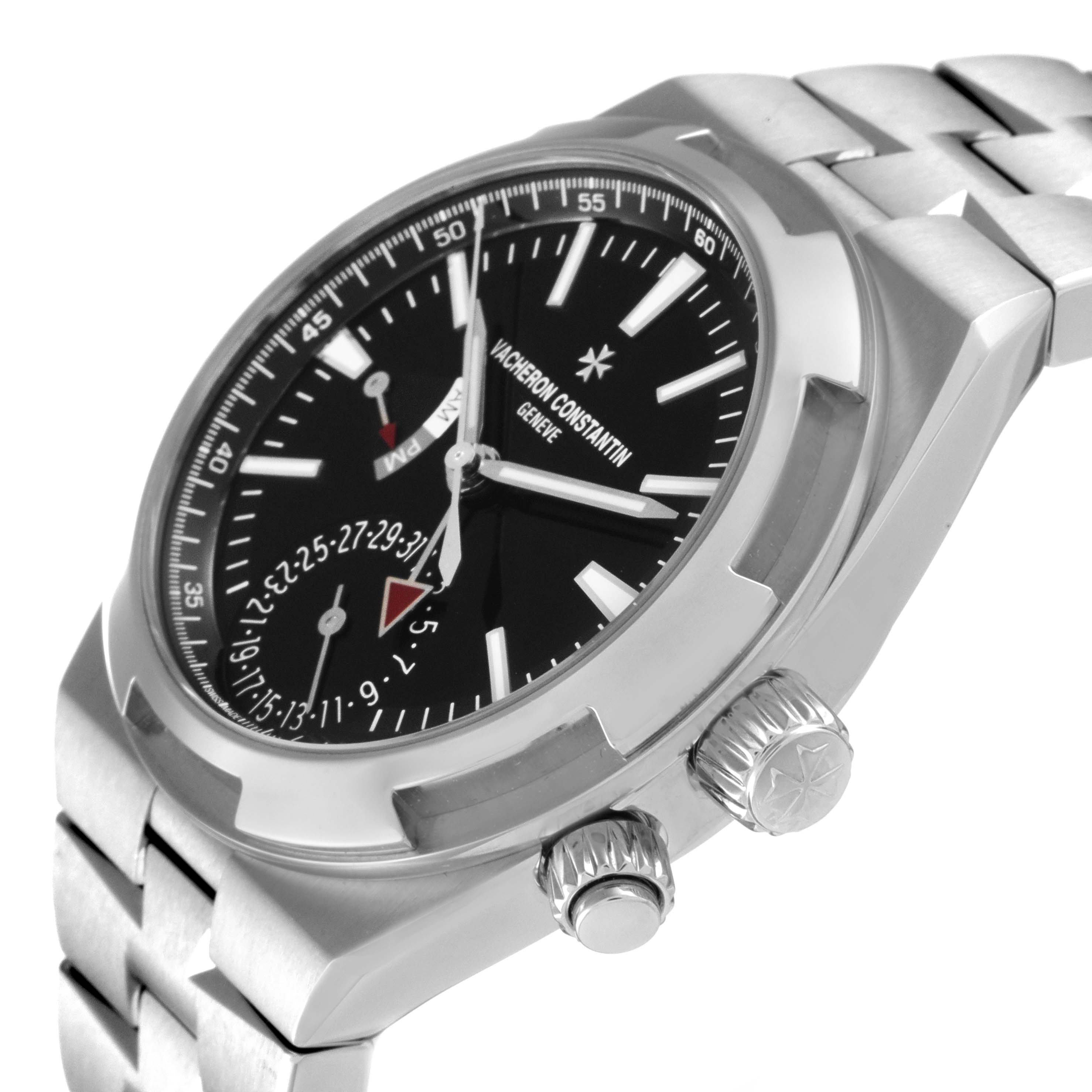 The image shows a close-up angled view of the Vacheron Constantin Overseas 7900V/110A-B546 Men's Stainless Steel Black Dial 7900V/110A-B546 Men's Stainless Steel Black Dial watch, featuring the dial, crown, bezel, and part of the bracelet.