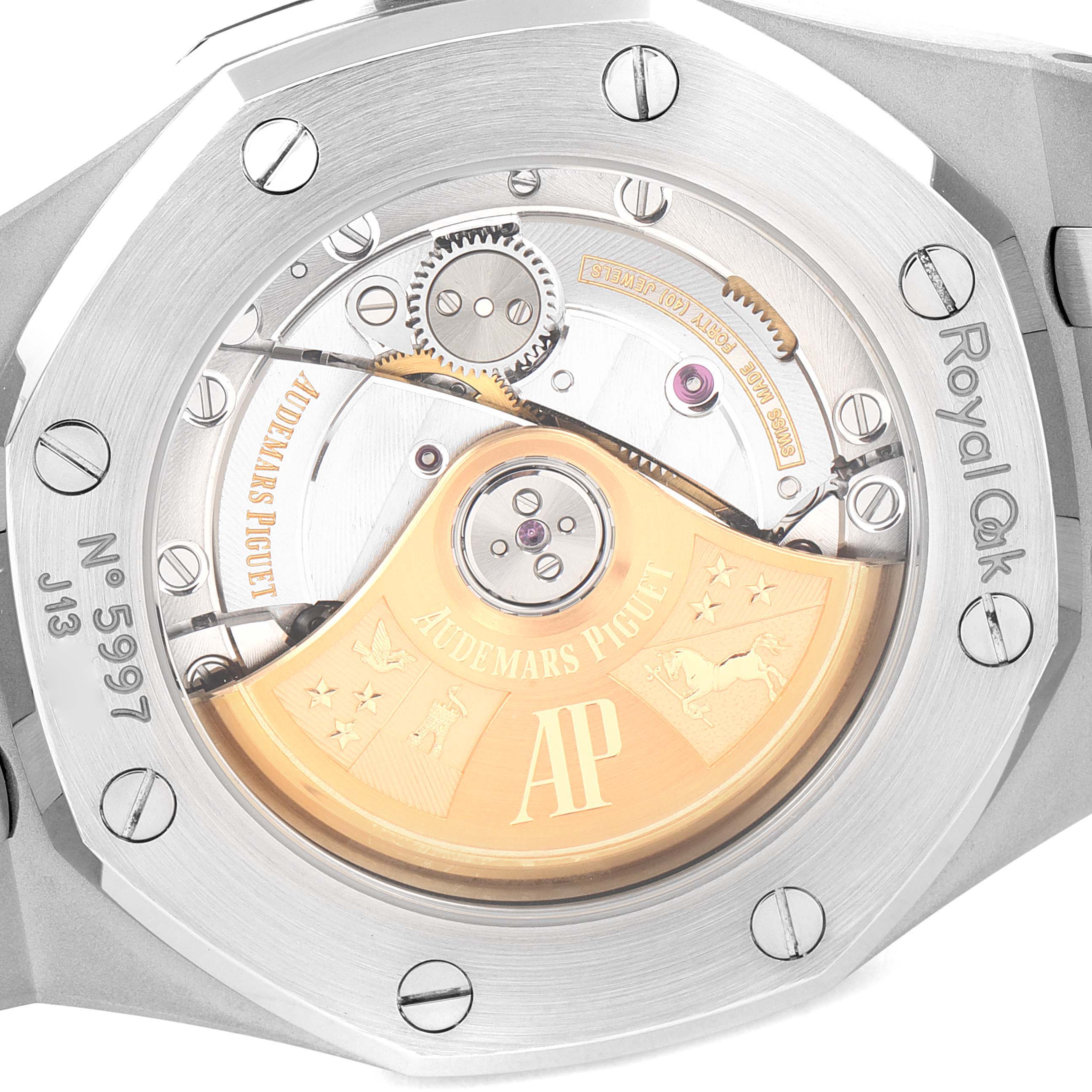 The image shows the back of the Audemars Piguet Royal Oak 15450ST.OO.1256ST.01 Men's Stainless Steel Silver Dial 15450ST.OO.1256ST.01 Men's Stainless Steel Silver Dial model, highlighting its intricate movement and engravings.