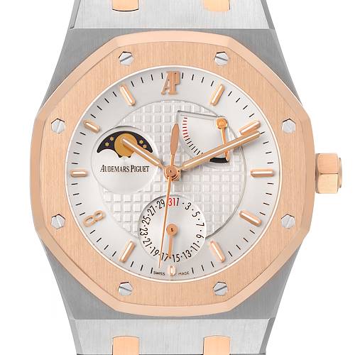 The Audemars Piguet Royal Oak 26168SR Men's Steel and Gold (two tone) Silver Dial is shown from a front angle, displaying its octagonal bezel, dial with moon phase, and power reserve indicators.