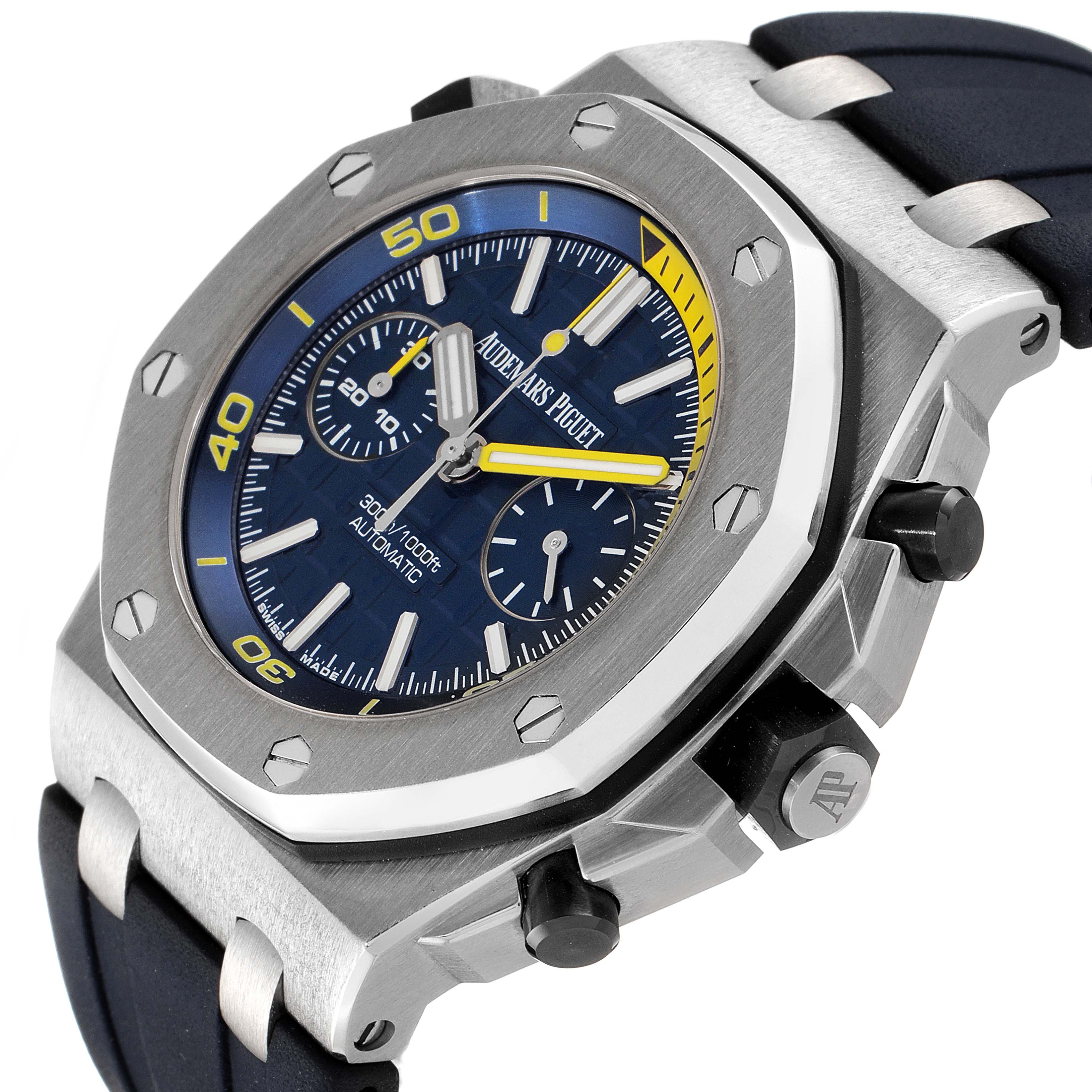 The Audemars Piguet Royal Oak Offshore 26703ST.OO.A027CA.01 Men's Stainless Steel Blue Dial 26703ST.OO.A027CA.01 Men's Stainless Steel Blue Dial watch is shown from an angle displaying the face, pushers, crown, and part of the strap.