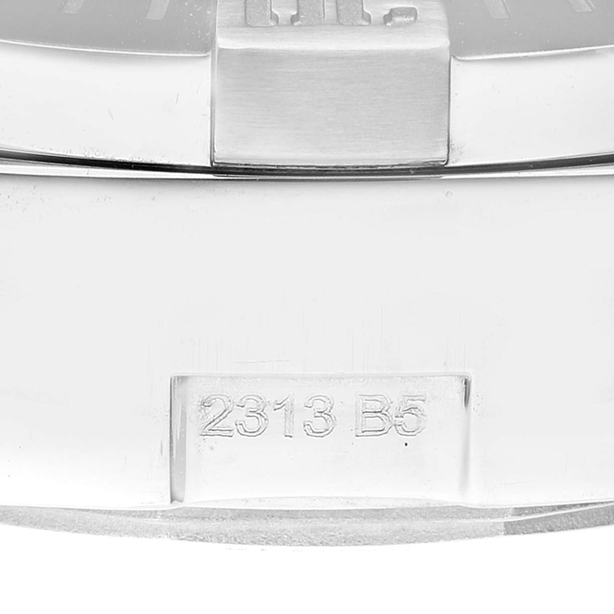 This close-up image shows the serial number engraving on the back of a Breitling Avenger A13381 Men's Stainless Steel Grey Dial A13381 Men's Stainless Steel Grey Dial watch.