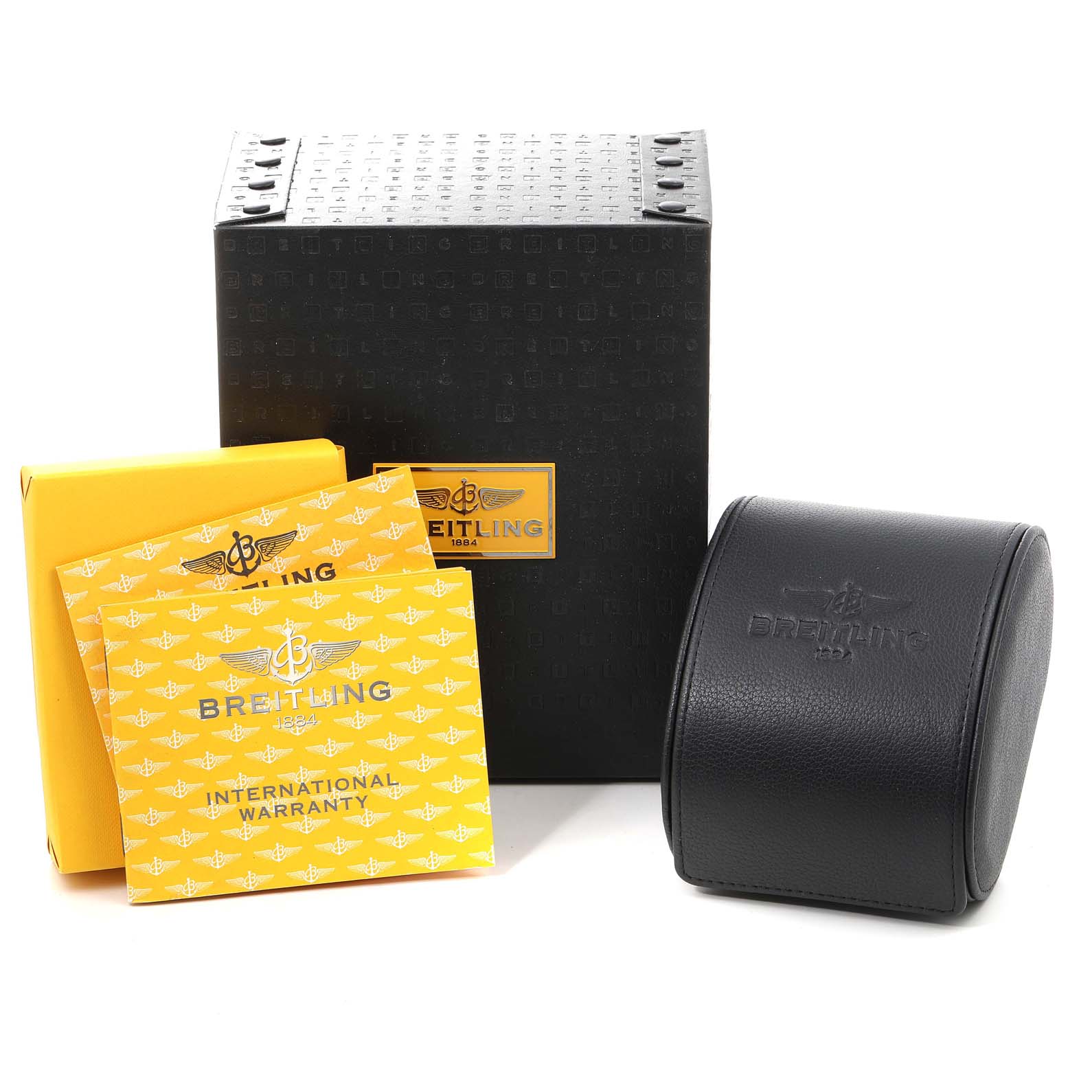 The image shows the packaging, international warranty card, and a travel case for the Breitling Chronomatic A41360 Men's Stainless Steel Silver Dial A41360 Men's Stainless Steel Silver Dial watch.