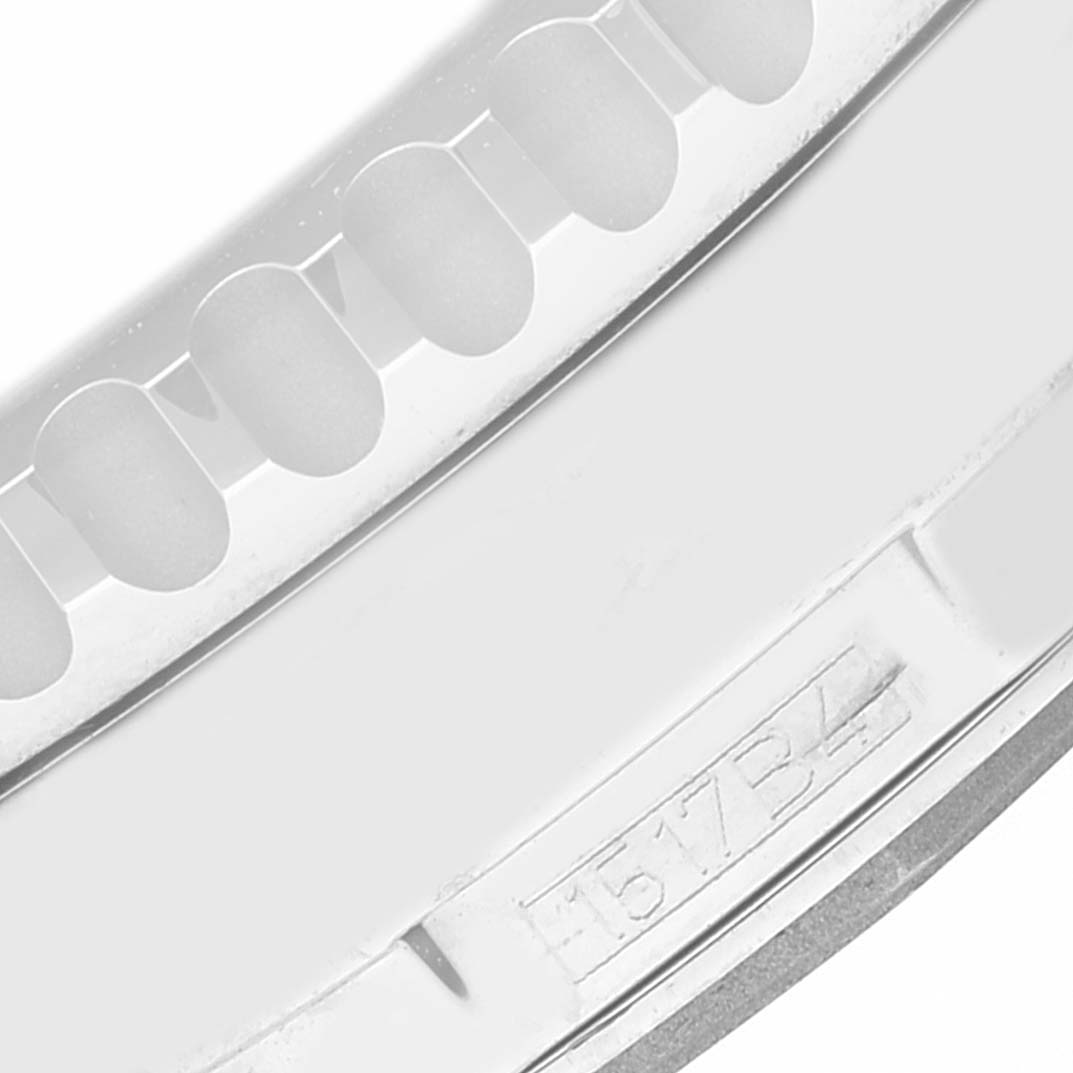 The image shows a close-up of the bezel edge and part of the casing with the model number of a Breitling Navitimer A2432212/C651 Men's Stainless Steel Blue Dial A2432212/C651 Men's Stainless Steel Blue Dial watch.