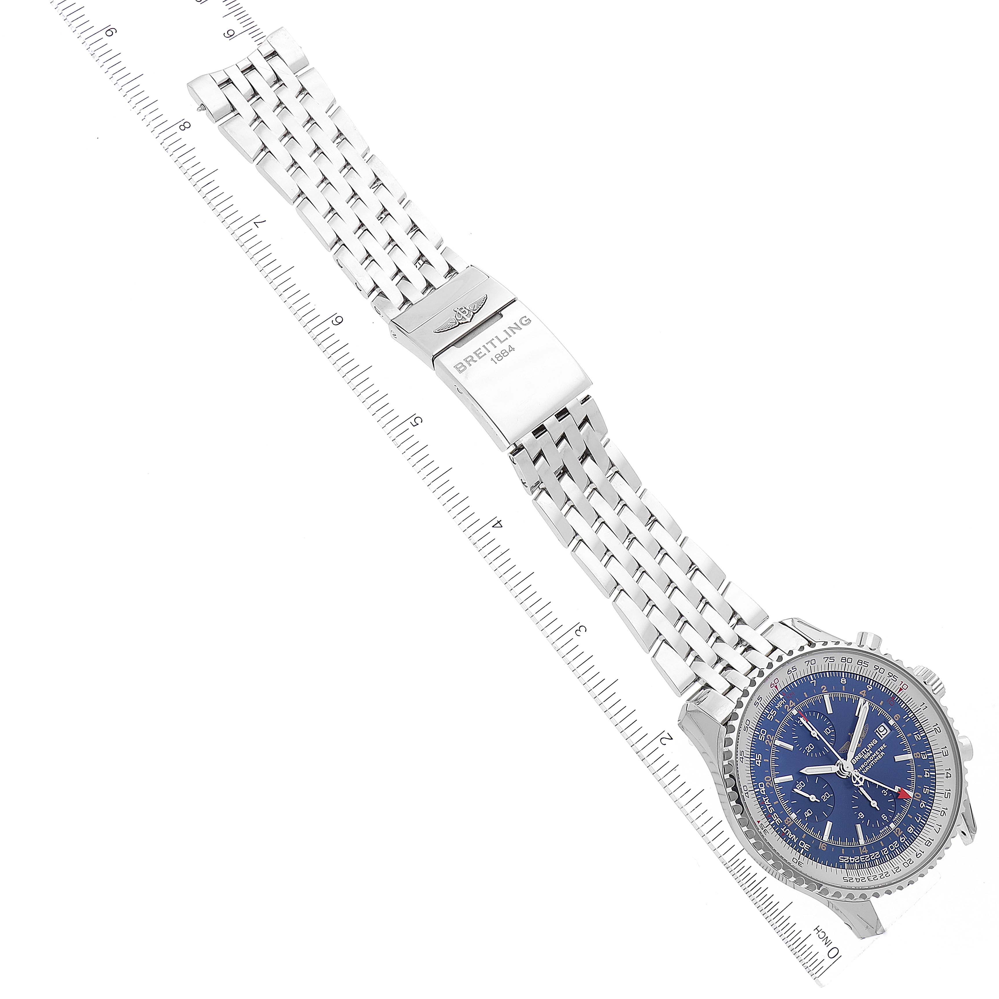 This image shows a Breitling Navitimer A2432212/C651 Men's Stainless Steel Blue Dial A2432212/C651 Men's Stainless Steel Blue Dial watch from a top-down angle, displaying the dial, stainless steel bracelet, clasp, and part of a ruler.
