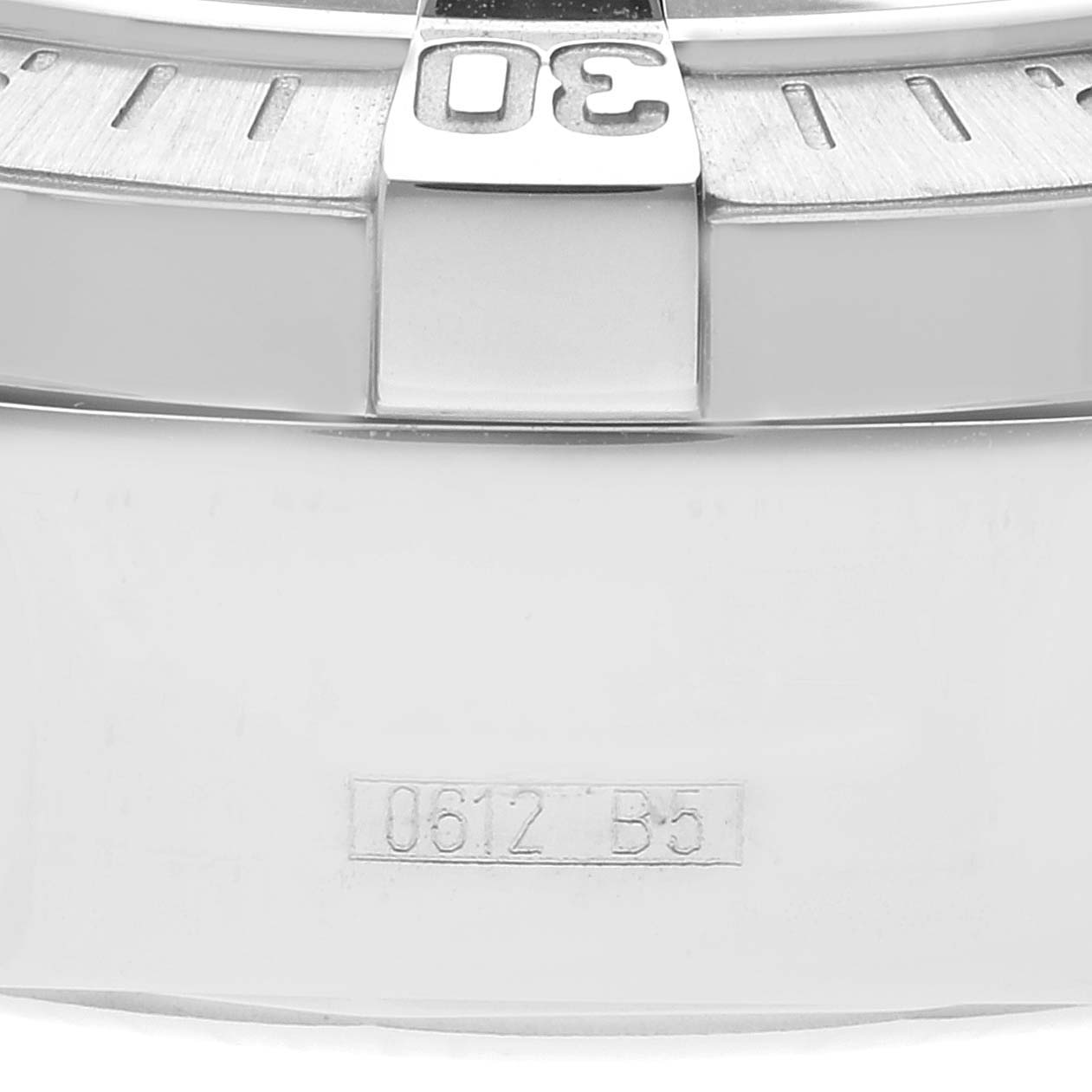 The image shows a close-up of the bezel and part of the case back of the Breitling Superocean A13340 Men's Stainless Steel Black Dial A13340 Men's Stainless Steel Black Dial watch.