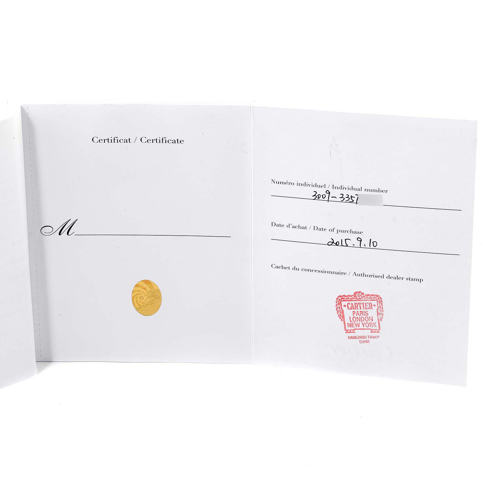 This image shows the certificate and authorized dealer stamp for a Cartier Ballon Bleu W69007Z3 Women
s Steel and Gold (two tone) Silver Dial W69007Z3 Women
s Steel and Gold (two tone) Silver Dial model watch.