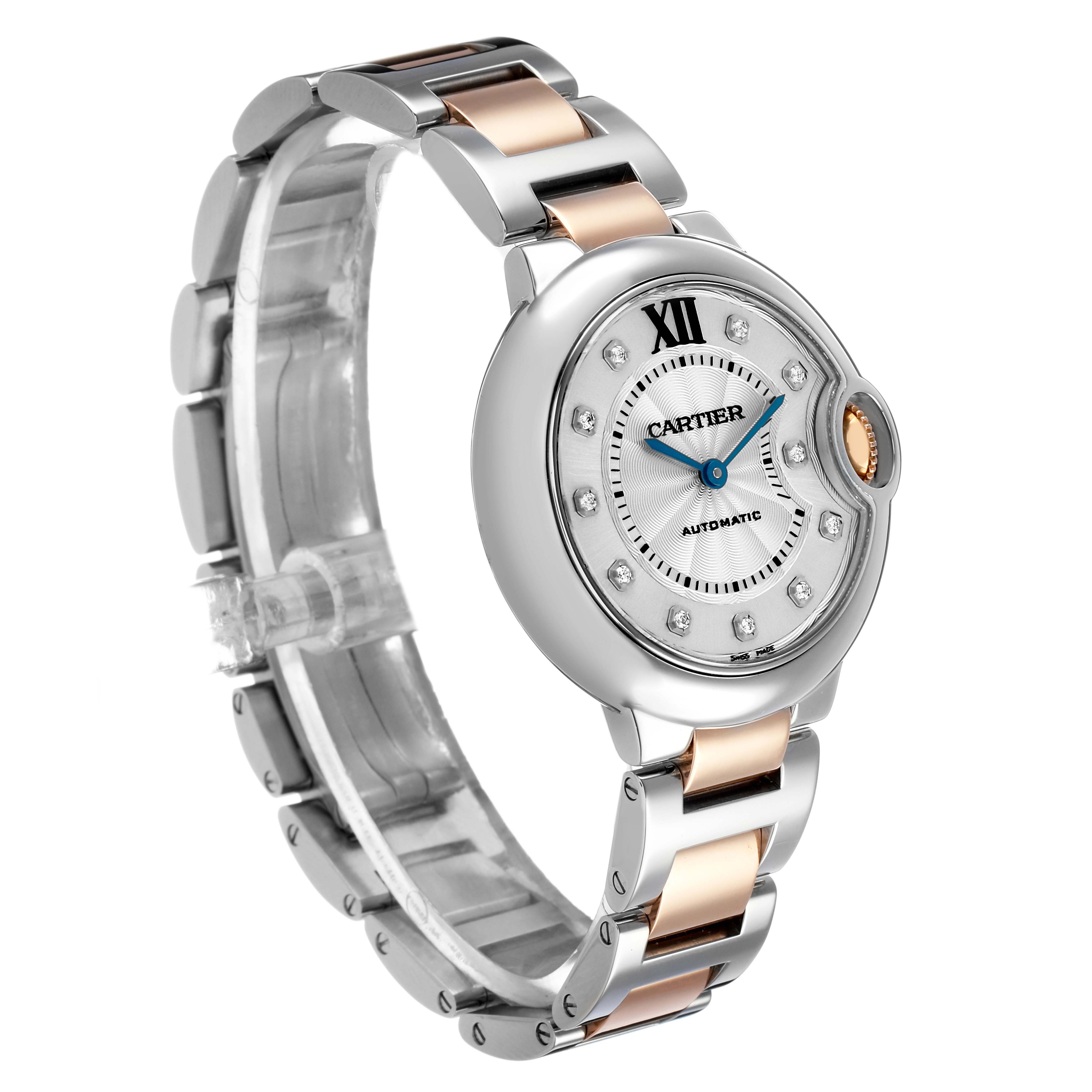 The Cartier Ballon Bleu WE902044 Women's Stainless Steel Silver Dial watch is shown at a front left angle, highlighting the round face and two-tone bracelet.
