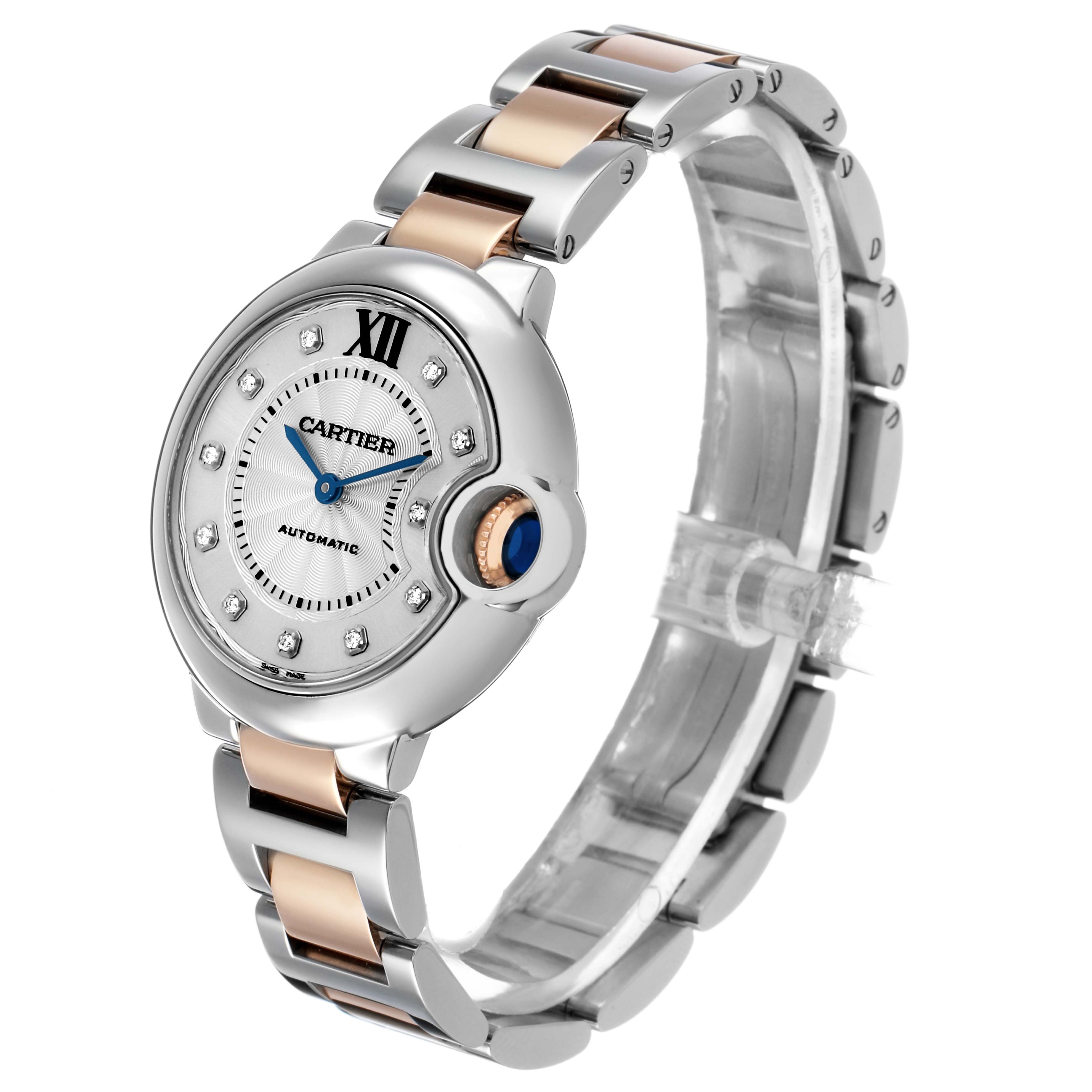 The Cartier Ballon Bleu WE902044 Women's Stainless Steel Silver Dial watch is shown at a three-quarter angle, highlighting the face, bracelet, and crown.