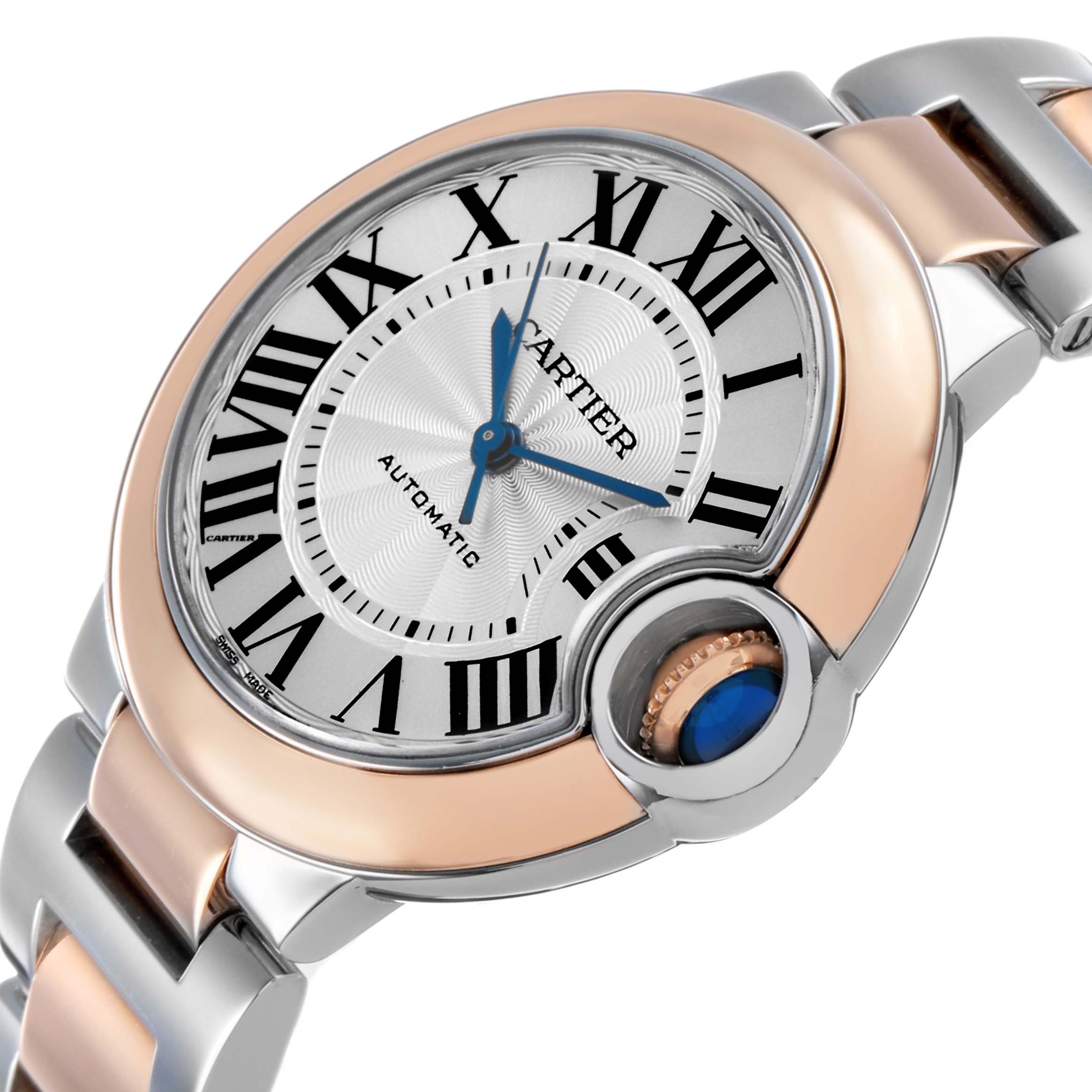 The Cartier Ballon Bleu W2BB0032 Women's Steel and Gold (two tone) Silver Dial watch is shown at an angled view, highlighting the dial, crown, and part of the bracelet.