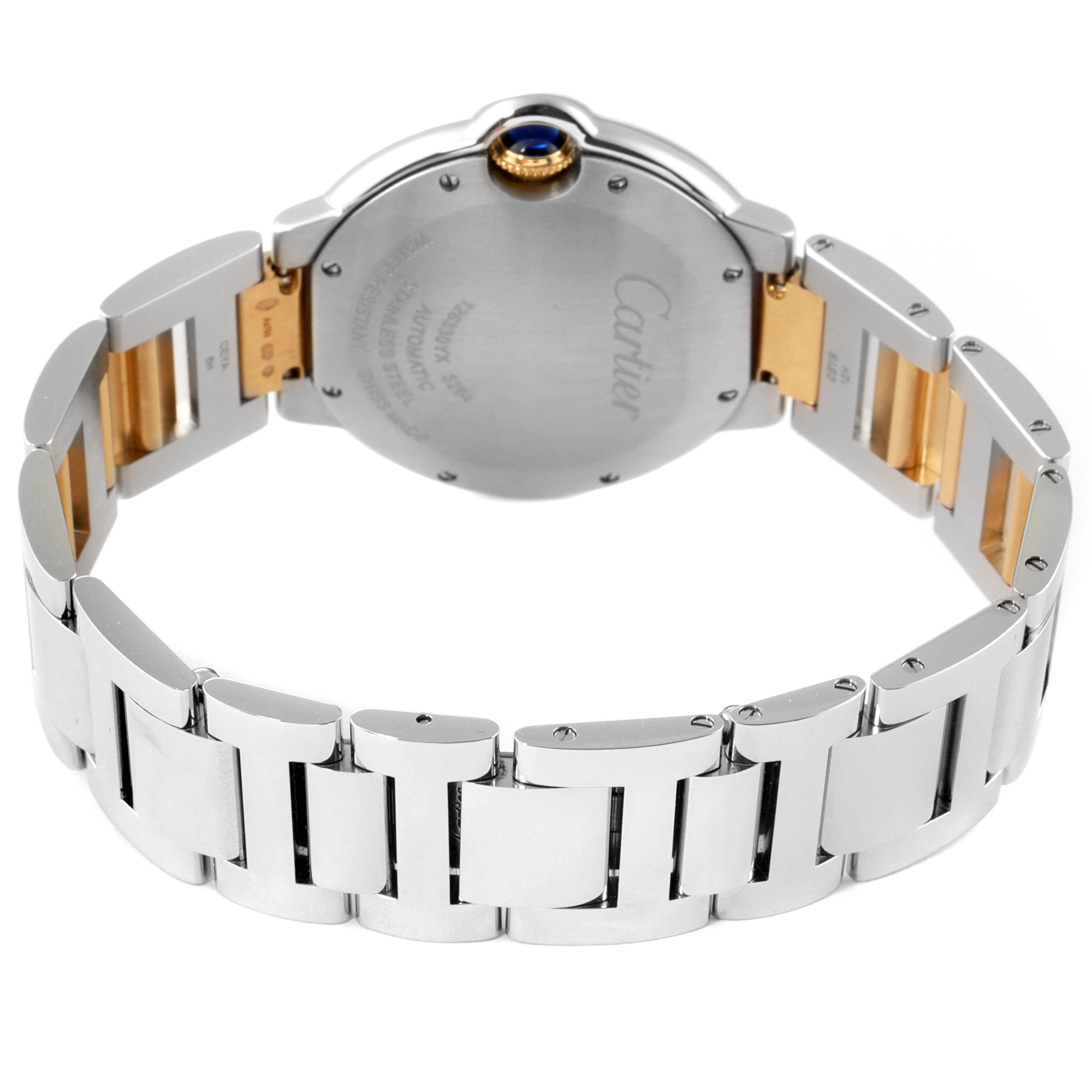 This image shows the back and bracelet of a Cartier Ballon Bleu W2BB0012 Men's Steel and Gold (two tone) Silver Dial W2BB0012 Men's Steel and Gold (two tone) Silver Dial watch, highlighting the crown and clasp mechanism.