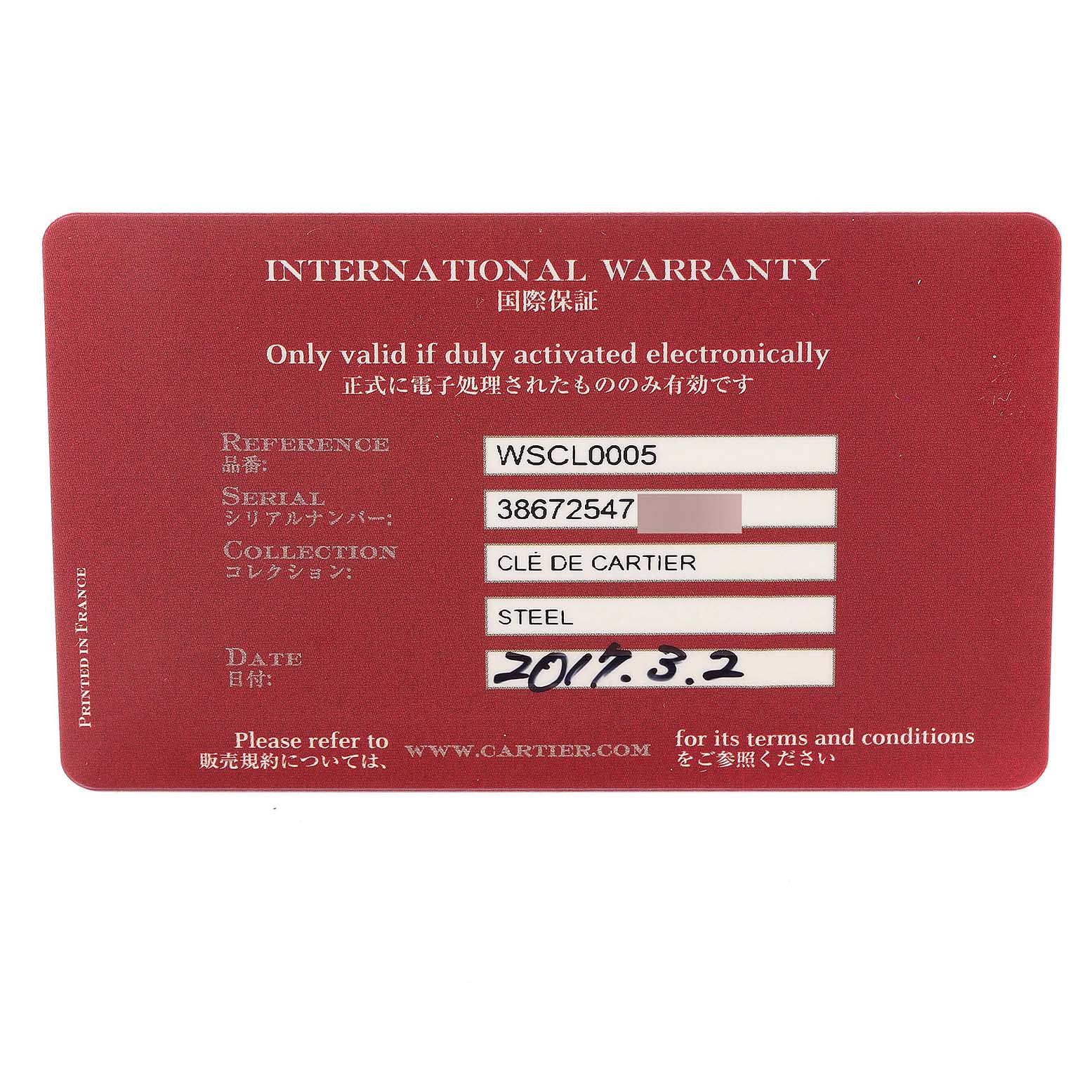 This is the International Warranty card for the Clé de Cartier watch model by Cartier, showing reference, serial number, collection, material, and date.