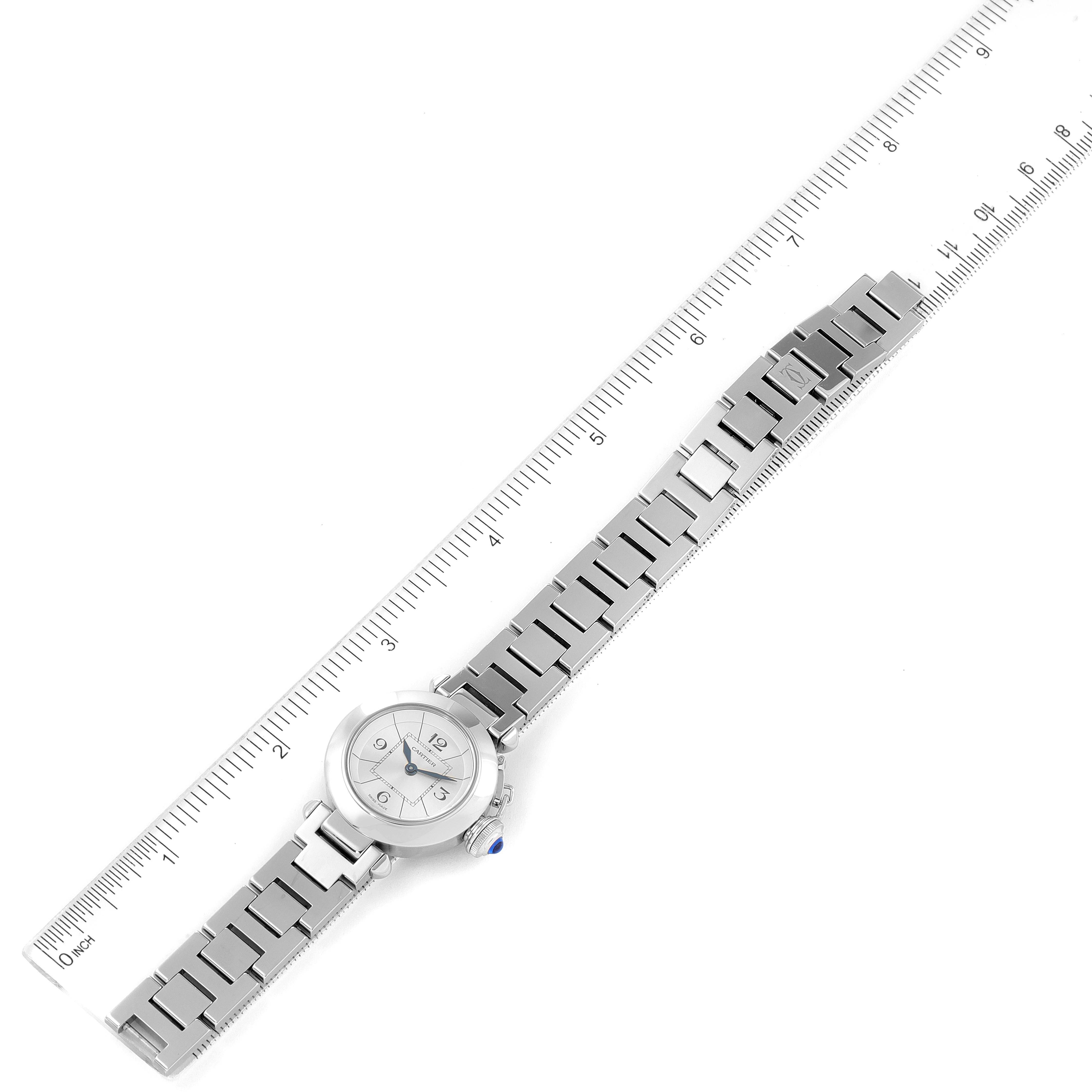 The Cartier Pasha W3140007 Women's Stainless Steel Silver Dial W3140007 Women's Stainless Steel Silver Dial watch is shown at a top-down angle, displaying the full dial and the entire metal bracelet.