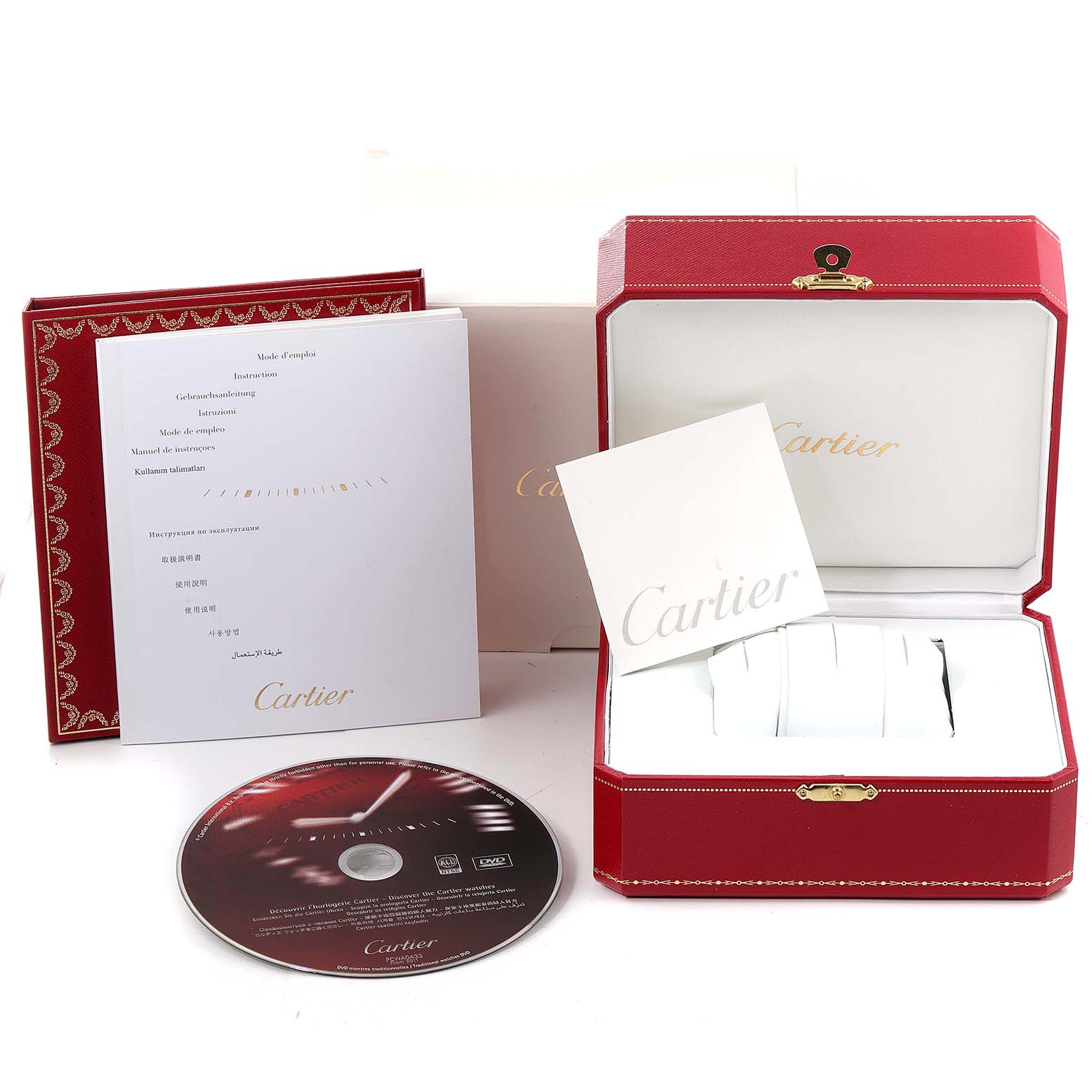 The image shows the Cartier Pasha W3140007 Women's Stainless Steel Silver Dial W3140007 Women's Stainless Steel Silver Dial watch box, manual, warranty card, and a CD from a front angle.