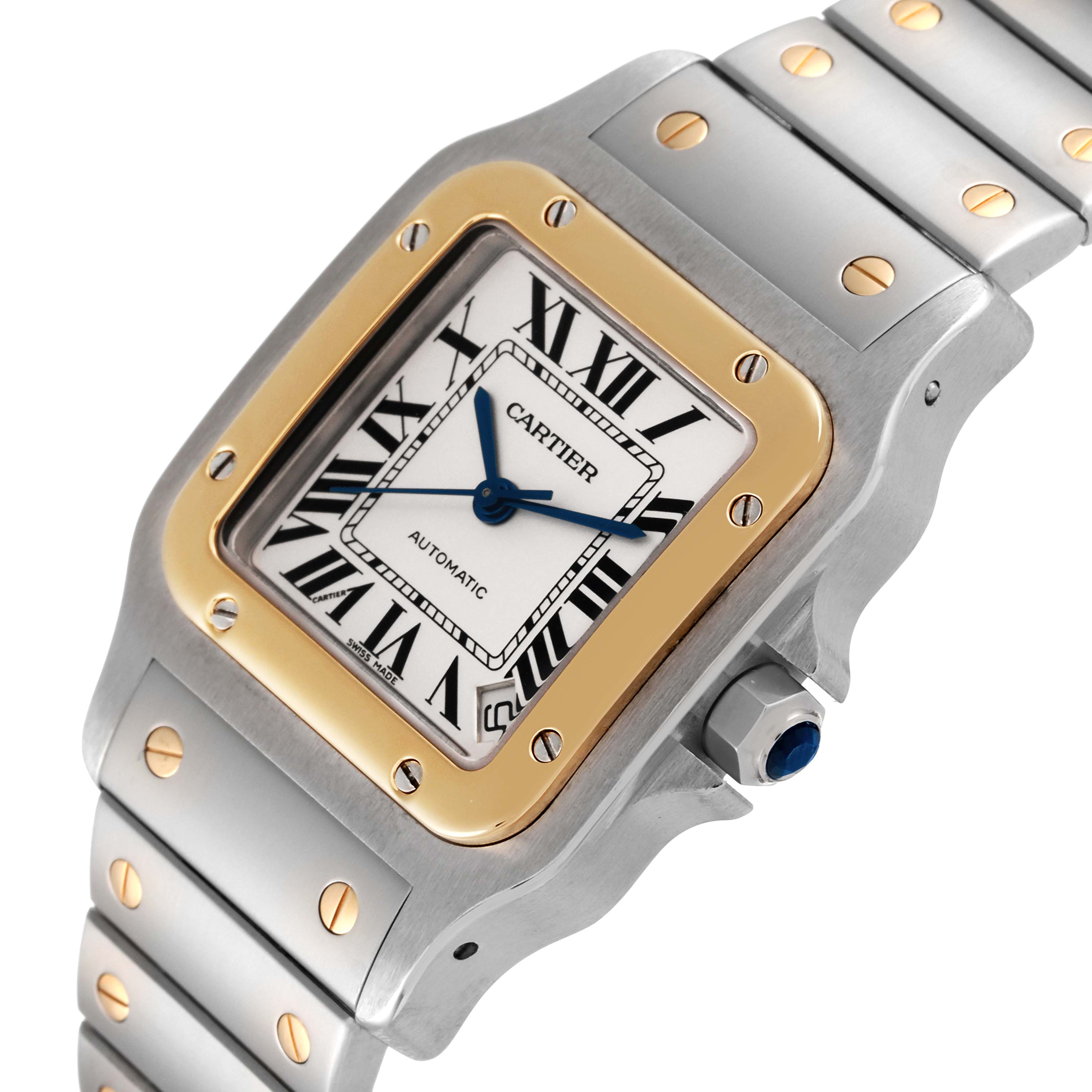 The image shows an angled view of the Cartier Santos W20099C4 Men's Steel and Gold (two tone) Silver Dial W20099C4 Men's Steel and Gold (two tone) Silver Dial model, featuring the face, crown, and part of the bracelet.