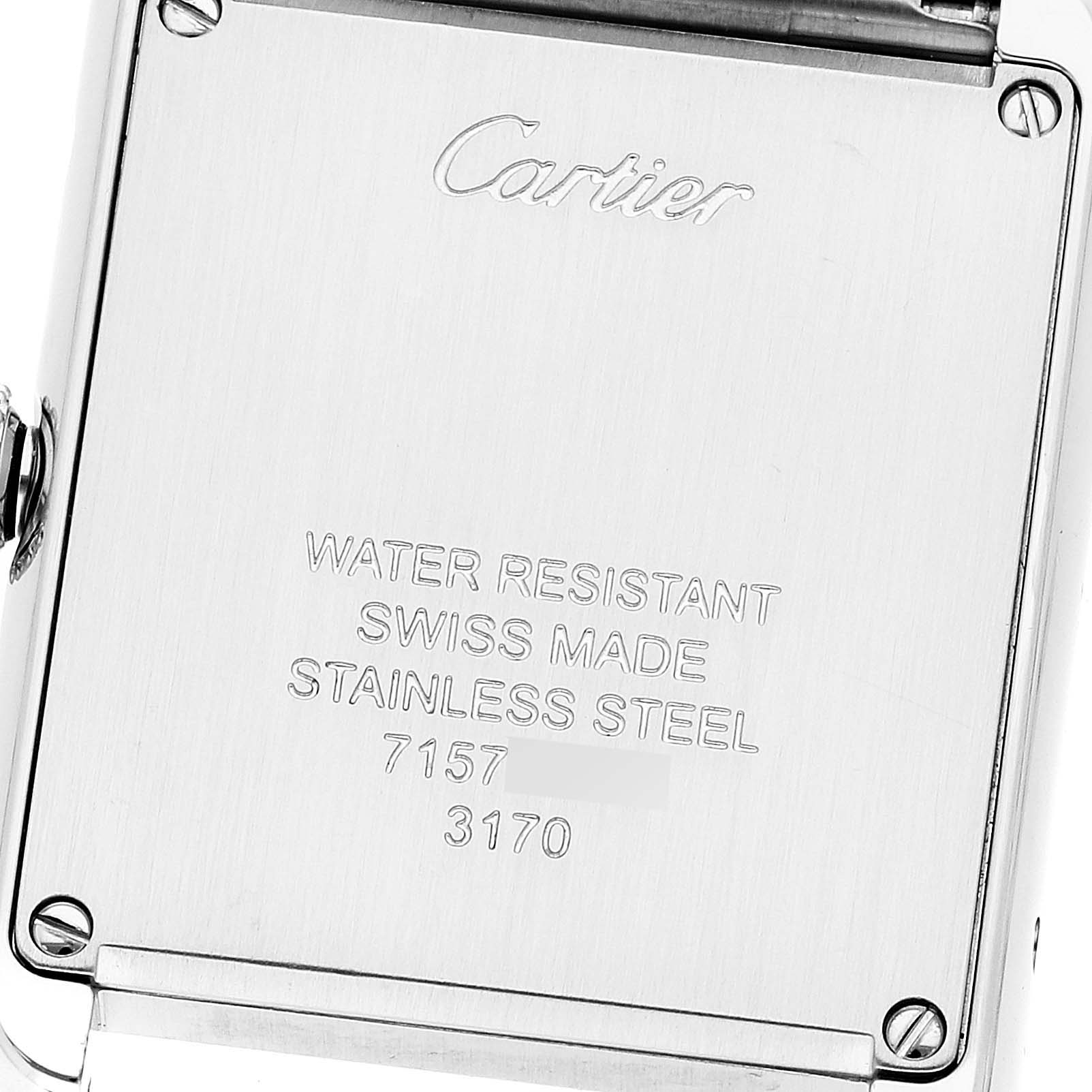 This image shows the back case of a Cartier Tank Solo W5200013 Women's Stainless Steel Silver Dial W5200013 Women's Stainless Steel Silver Dial watch, displaying engravings and screws.