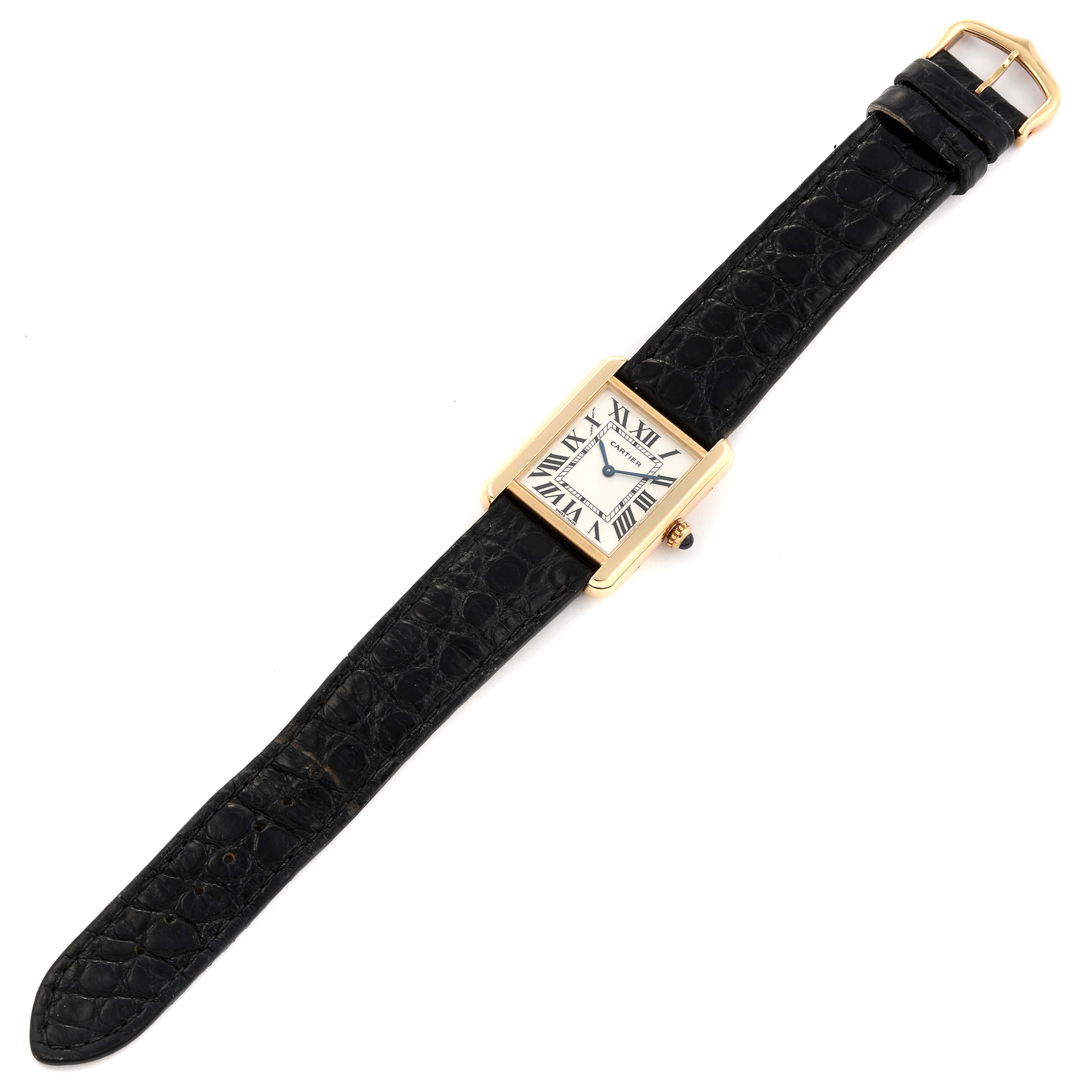 The image shows a top-down view of a Cartier Tank Solo W1018755 Women's Yellow Gold Silver Dial W1018755 Women's Yellow Gold Silver Dial watch, displaying its black leather strap, white dial with Roman numerals, and gold case.