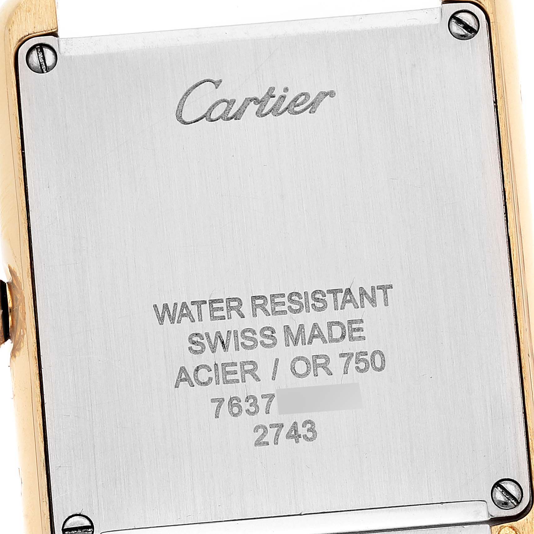 This image shows the back of a Cartier Tank Solo W1018755 Women's Yellow Gold Silver Dial W1018755 Women's Yellow Gold Silver Dial watch, featuring branding and specifications.