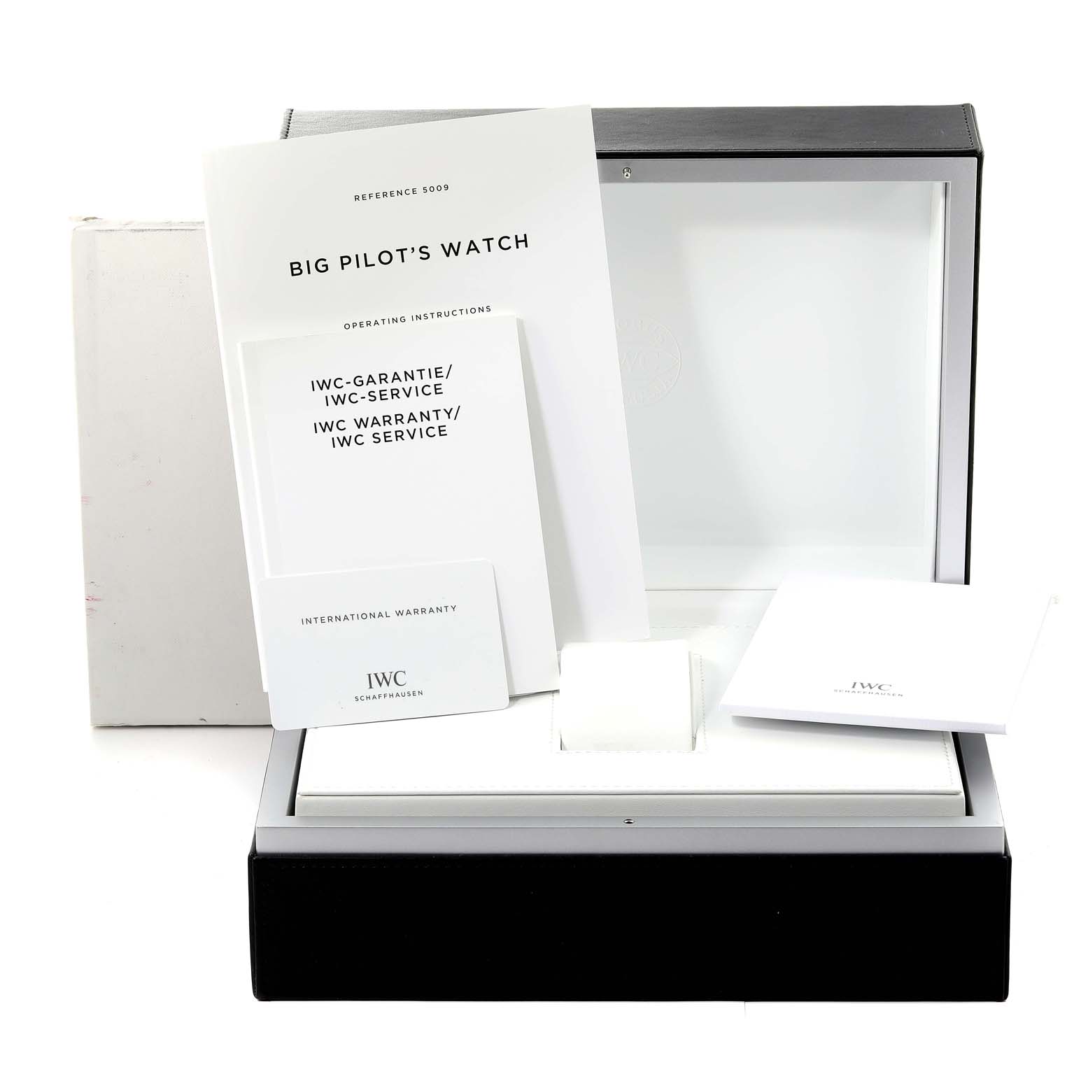 This image shows the packaging, manuals, and warranty documents for the IWC Pilot IW500912 Men's Stainless Steel Black Dial IW500912 Men's Stainless Steel Black Dial Big Pilot's Watch.