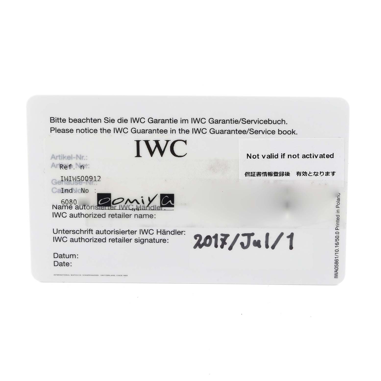 The image shows an IWC Pilot IW500912 Men's Stainless Steel Black Dial IW500912 Men's Stainless Steel Black Dial model warranty card, displaying the model details and retailer signature.