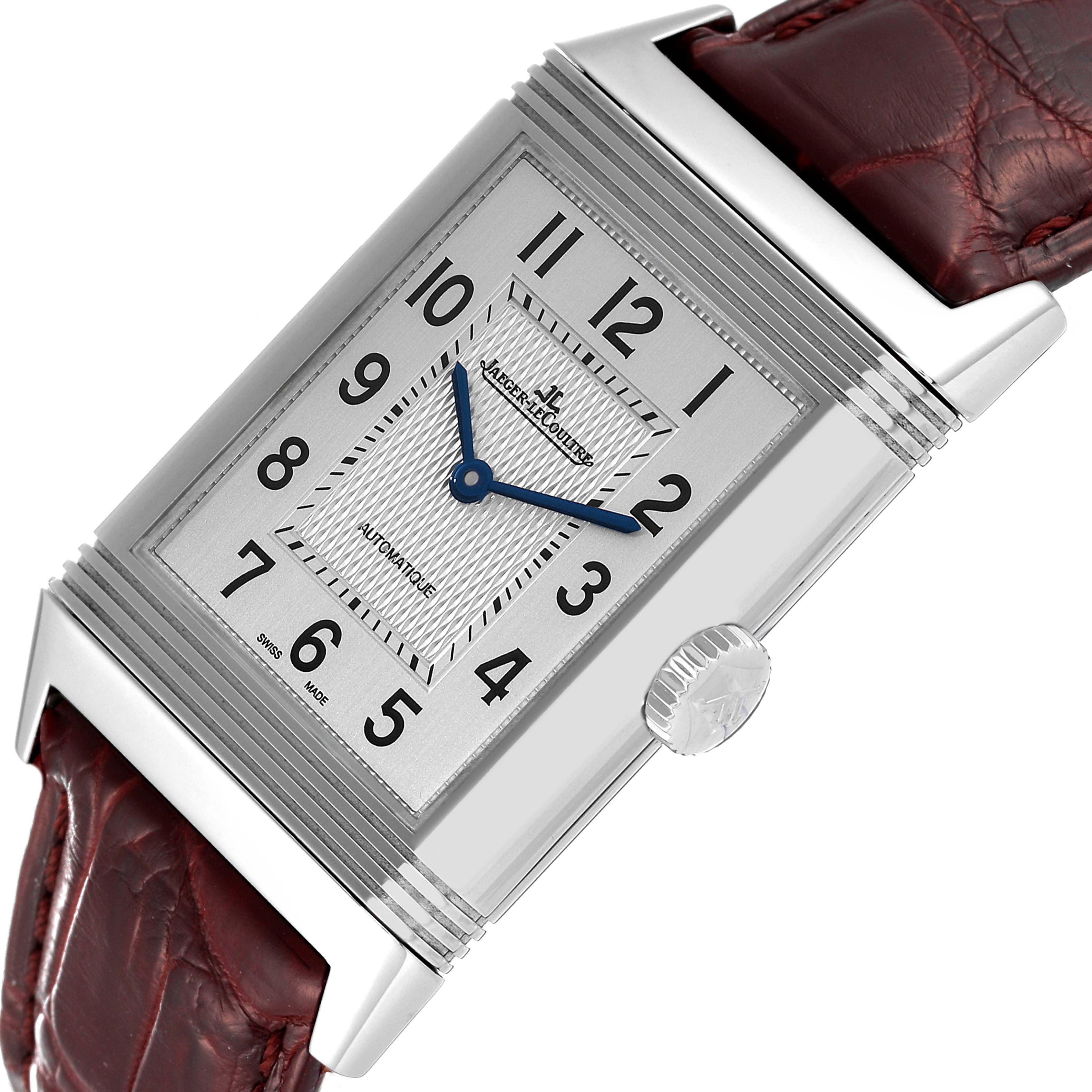 The image shows a Jaeger LeCoultre Reverso Q3828420 Men's Stainless Steel Silver Dial Q3828420 Men's Stainless Steel Silver Dial watch at an angle highlighting the face, crown, and leather strap.