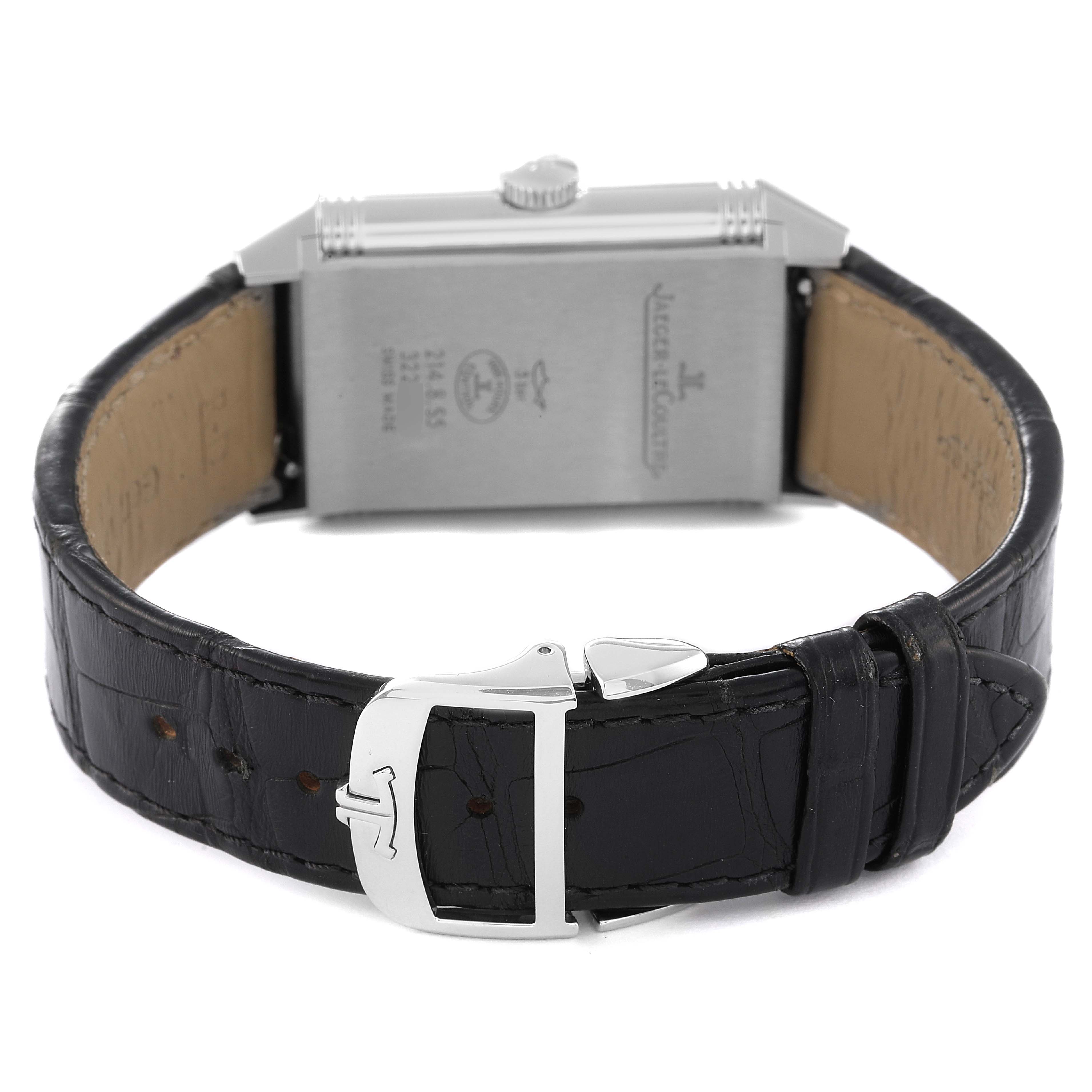 The image shows the back view of a Jaeger LeCoultre Reverso Q3828420 Men's Stainless Steel Silver Dial Q3828420 Men's Stainless Steel Silver Dial watch, highlighting its rectangular case, black leather strap, and clasp.
