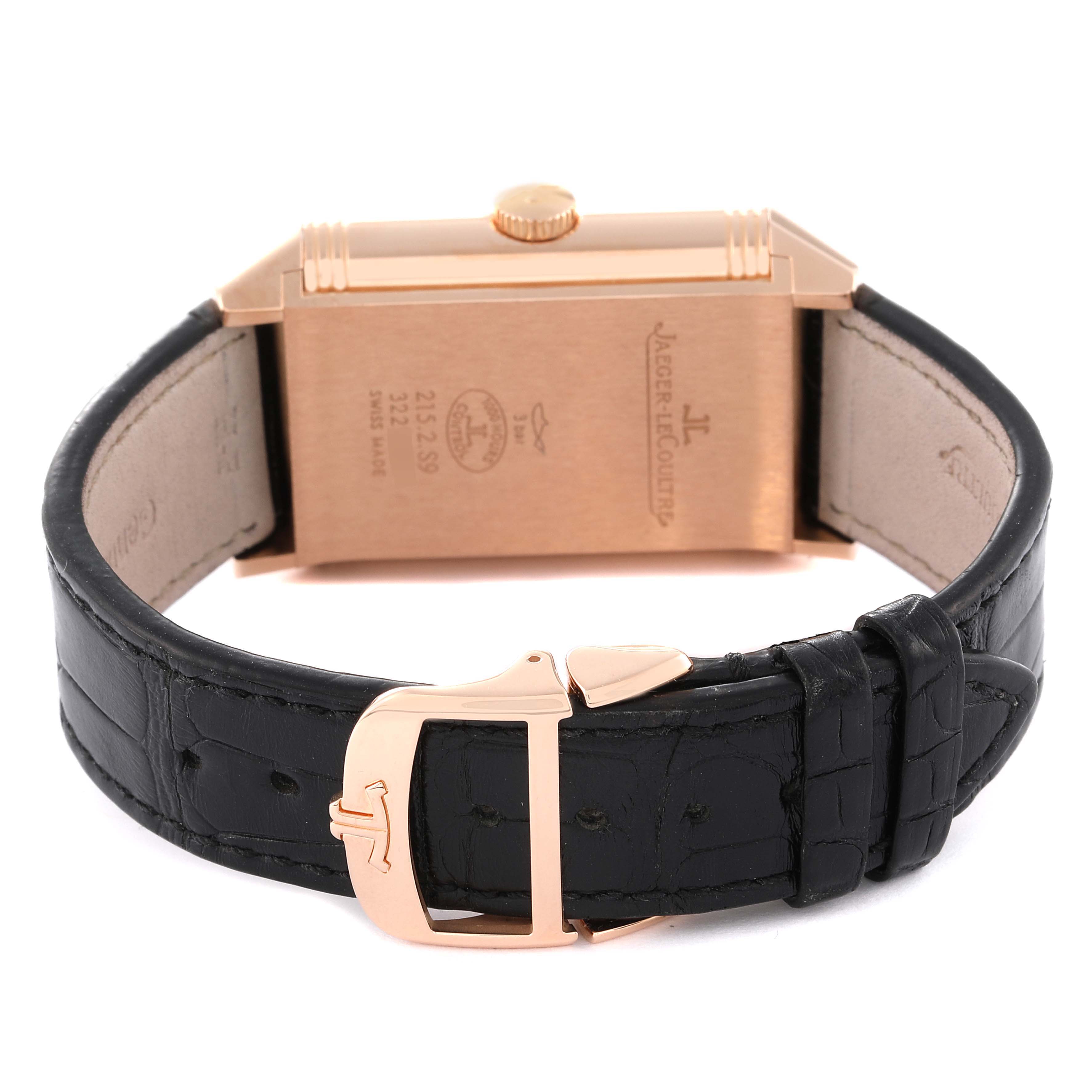 The image shows the back view of a Jaeger LeCoultre Reverso Q3832420 Men's Rose Gold Silver Dial Q3832420 Men's Rose Gold Silver Dial watch with its case and black leather strap.