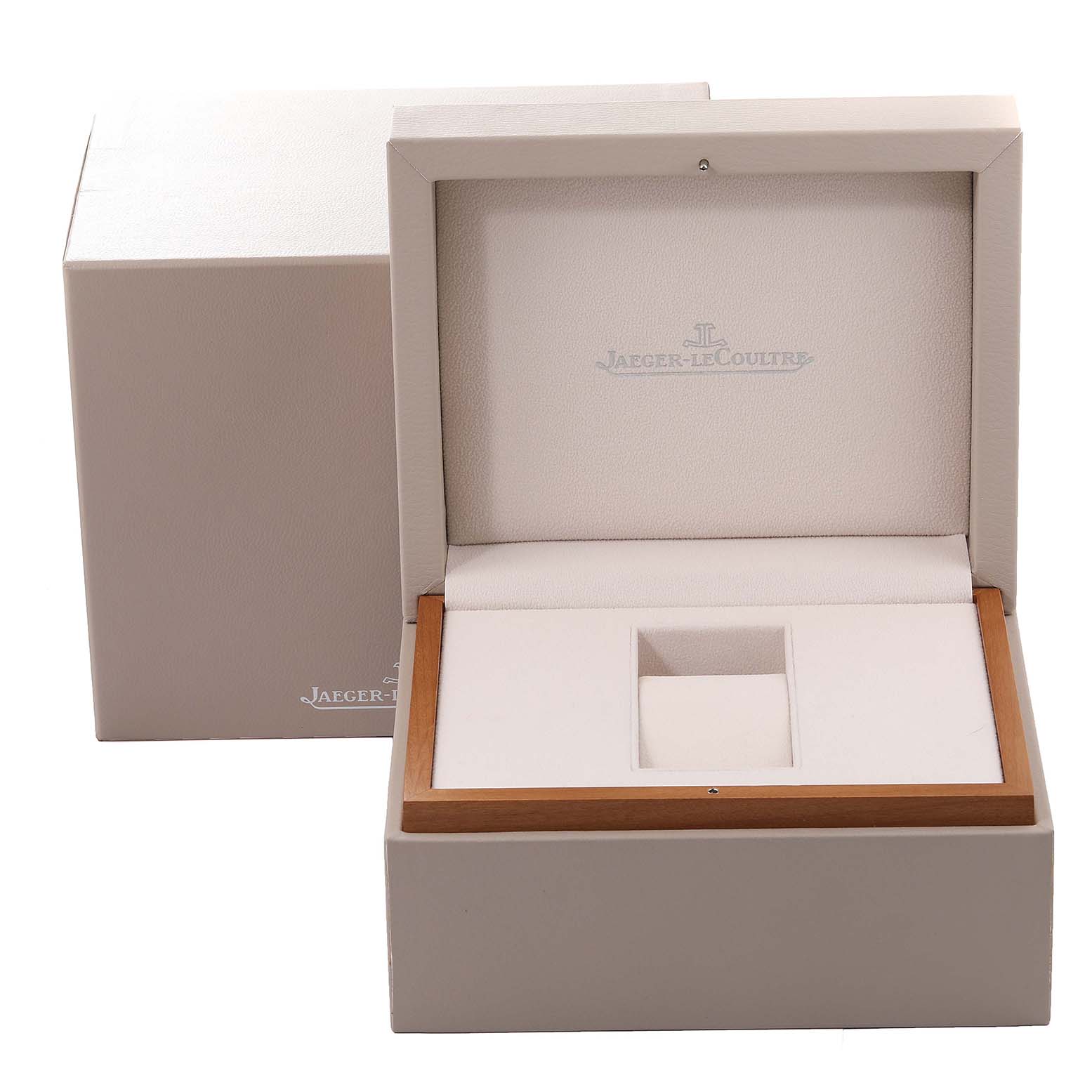 The image shows an open Jaeger LeCoultre Reverso Q3832420 Men's Rose Gold Silver Dial Q3832420 Men's Rose Gold Silver Dial watch box, revealing the interior space for the watch.