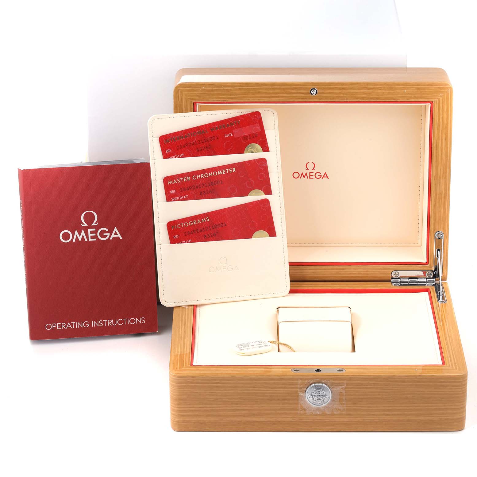 The image shows a wooden Omega Seamaster 234.92.41.21.10.001 Men's Bronze Black Dial 234.92.41.21.10.001 Men's Bronze Black Dial watch box with cards and an operating instructions booklet.